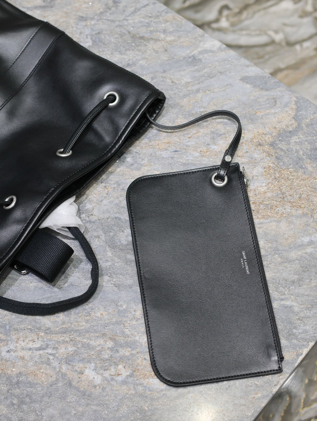 SAINT LAURENT RIVE GAUCHE BACKPACK 49 IN BLACK CALFSKIN