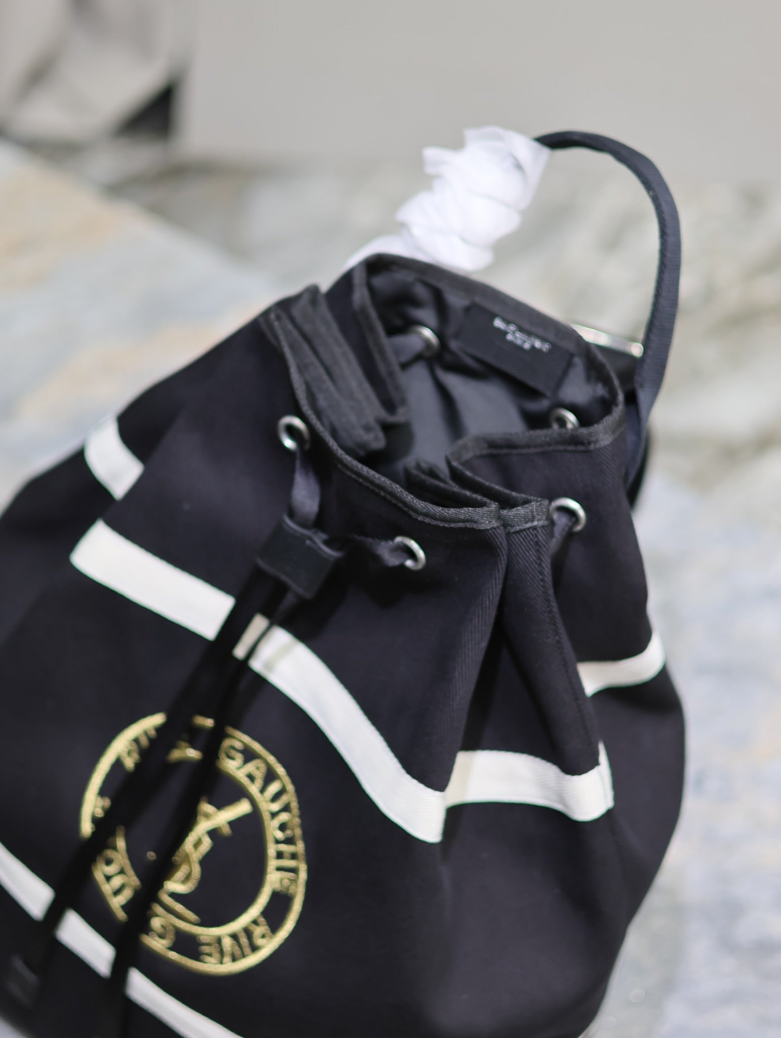 SAINT LAURENT RIVE GAUCHE BACKPACK 49 IN BLACK MIX WHITE CANVAS