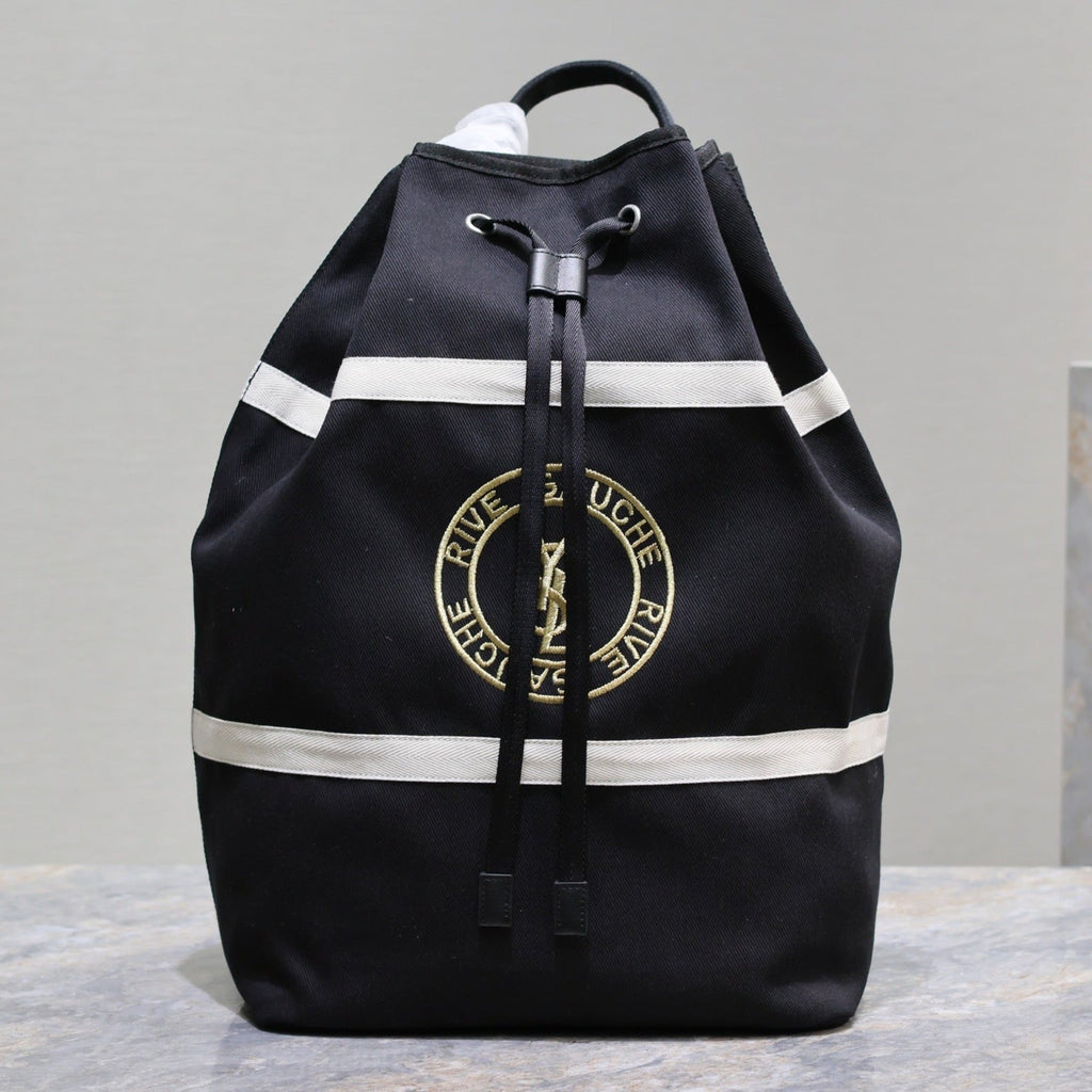 SAINT LAURENT RIVE GAUCHE BACKPACK 49 IN BLACK MIX WHITE CANVAS