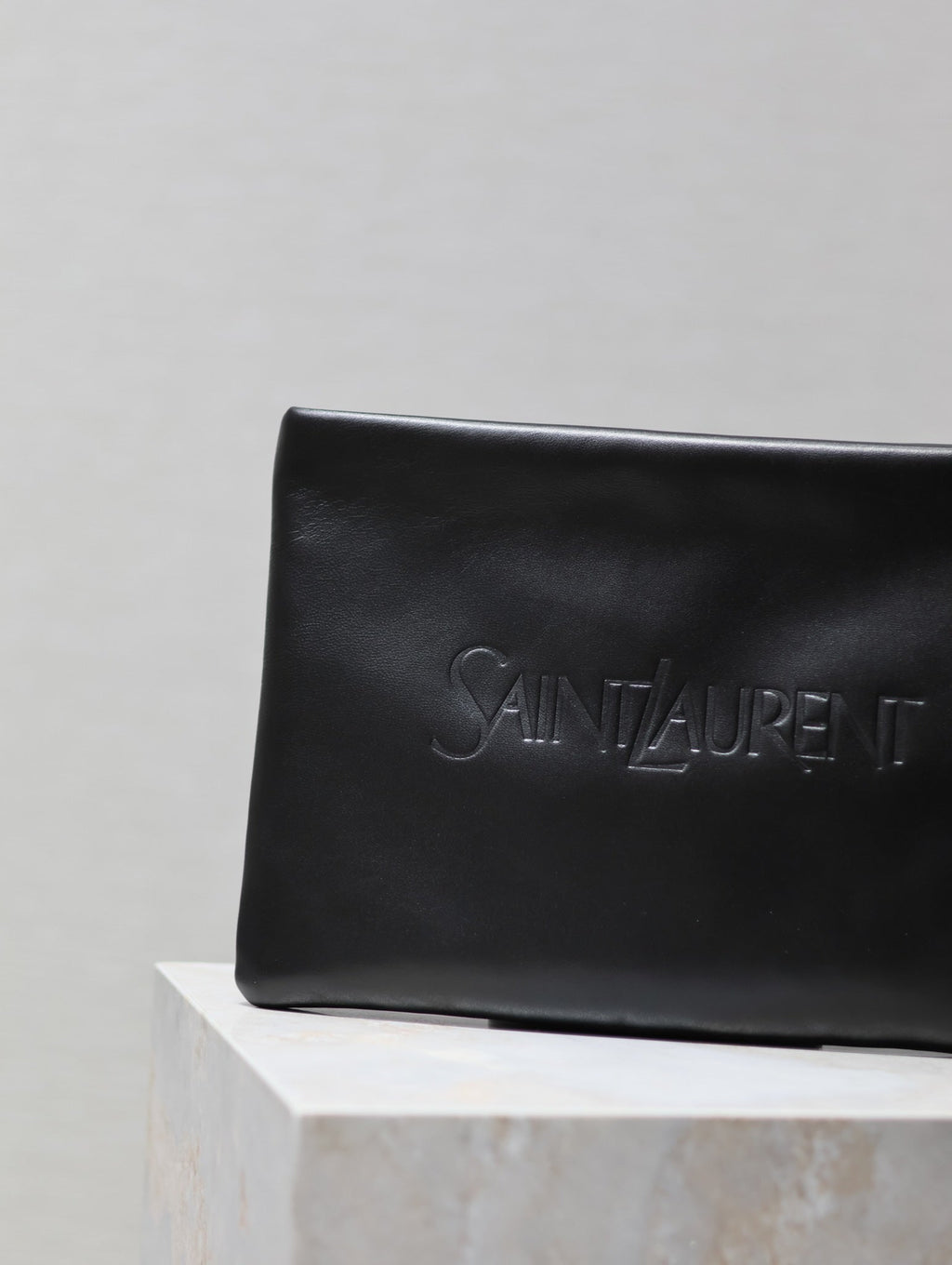 SAINT LAURENT POUCH 30 IN BLACK CALFSKIN WITH EMBOSSED LOGO