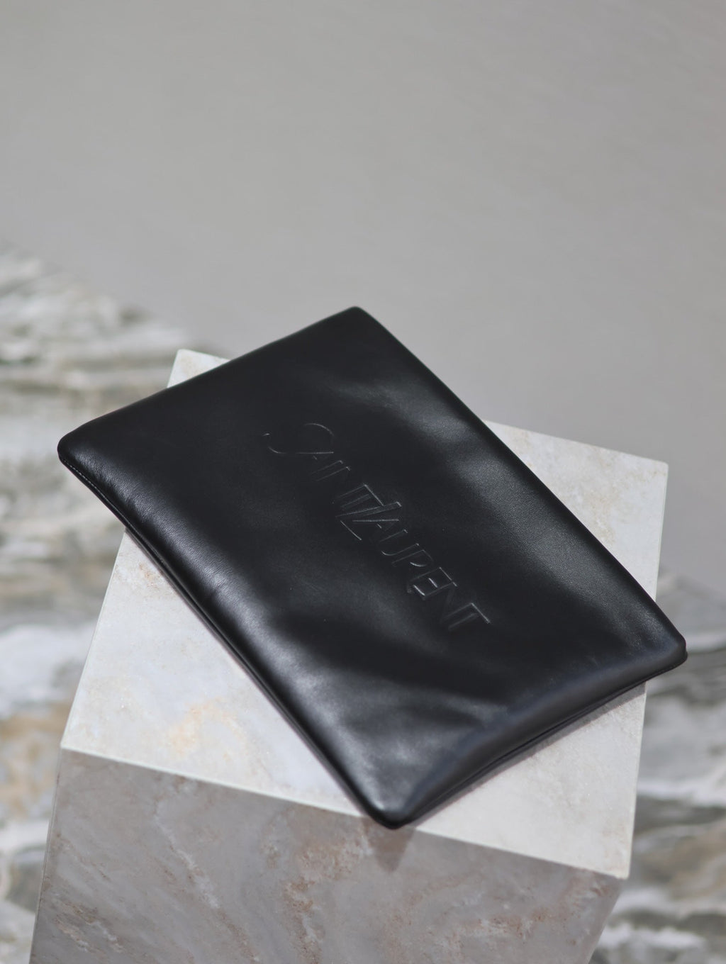 SAINT LAURENT POUCH 30 IN BLACK CALFSKIN WITH EMBOSSED LOGO
