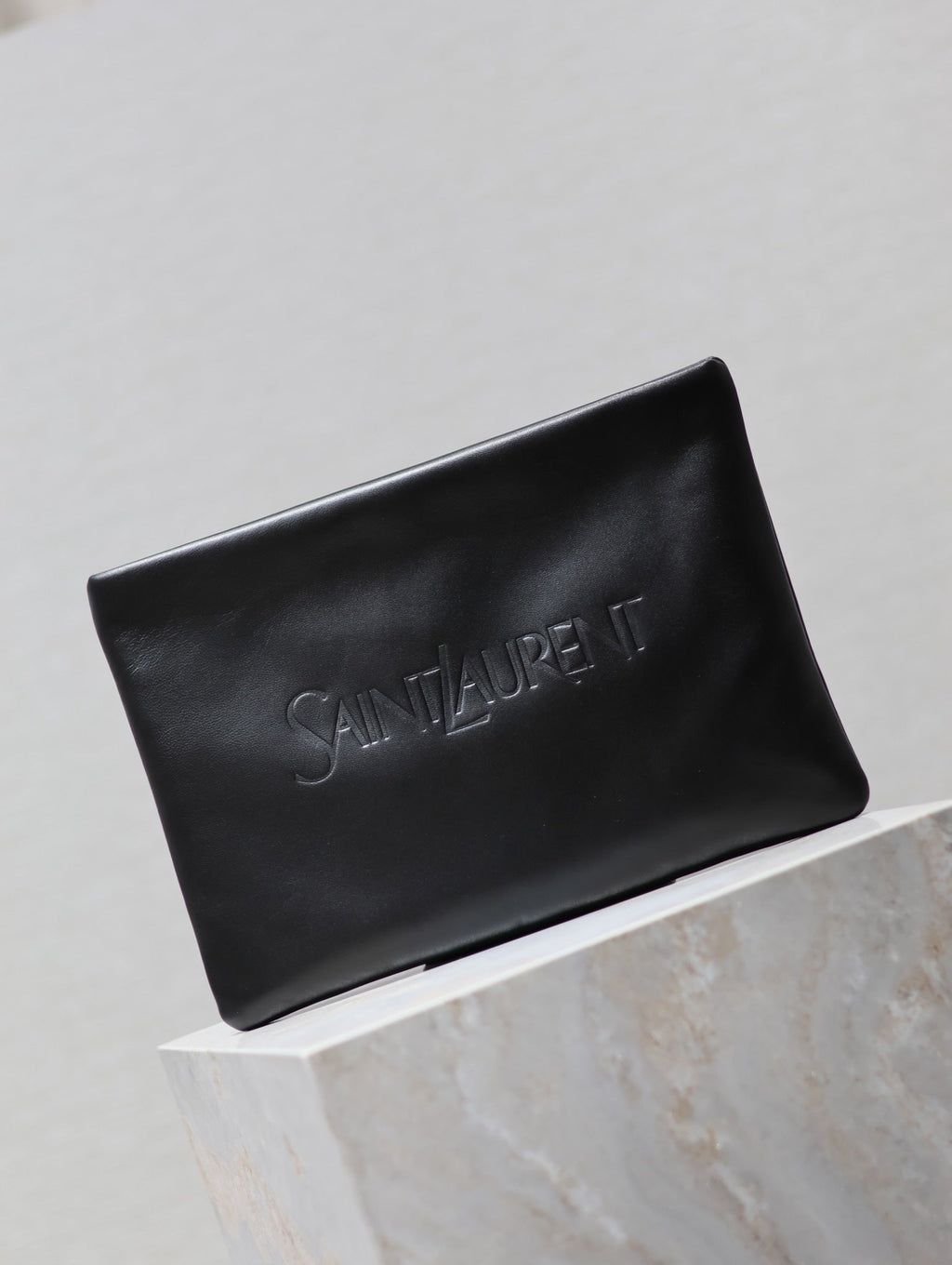 SAINT LAURENT POUCH 30 IN BLACK CALFSKIN WITH EMBOSSED LOGO