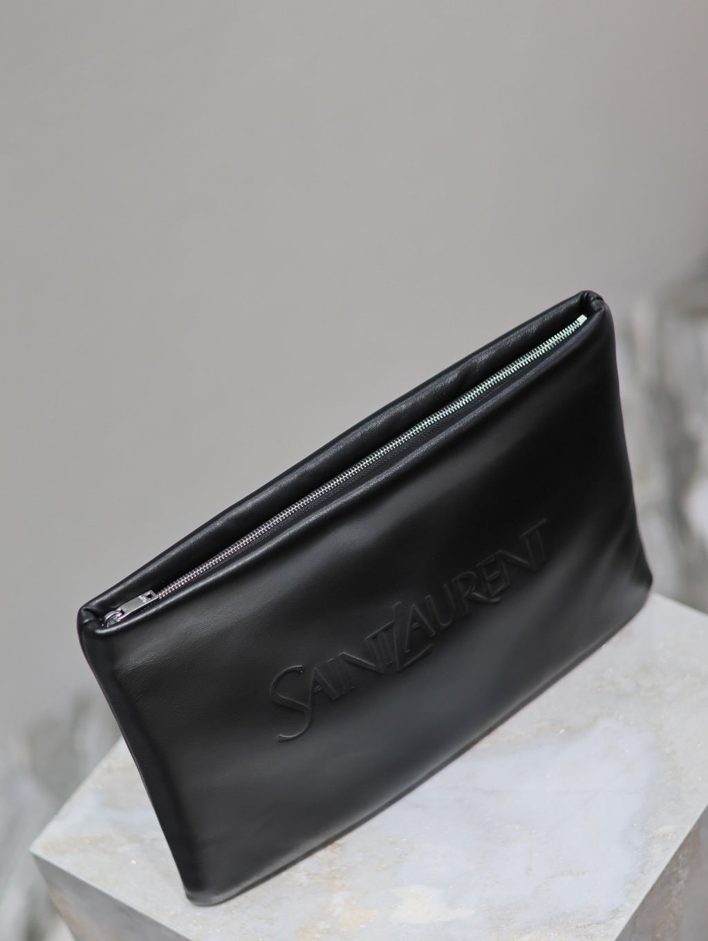 SAINT LAURENT POUCH 30 IN BLACK CALFSKIN WITH EMBOSSED LOGO