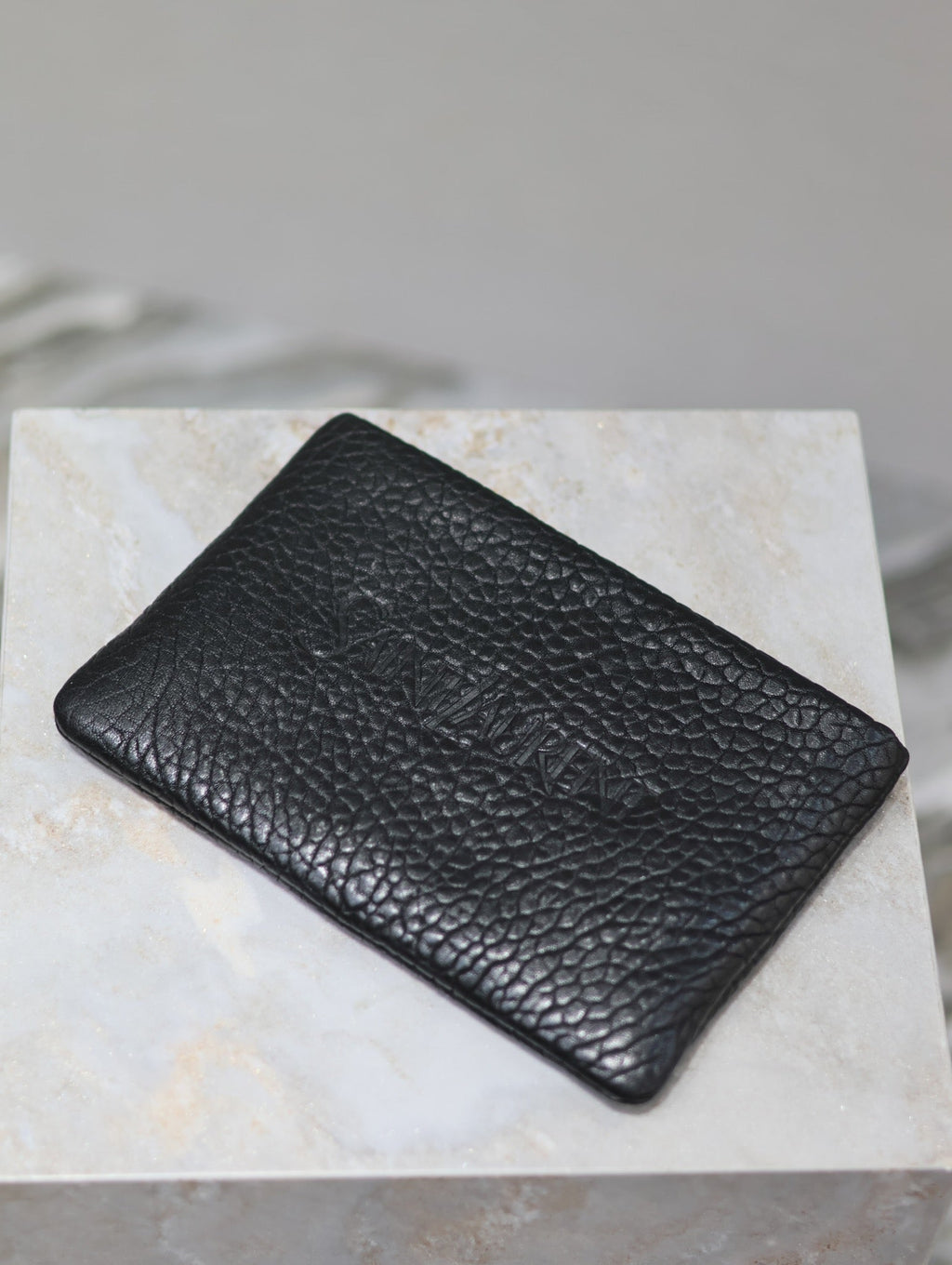 SAINT LAURENT POUCH WITH ELEPHANT TEXTURE 23 IN BLACK LAMBSKIN LOGO EMBOSSED