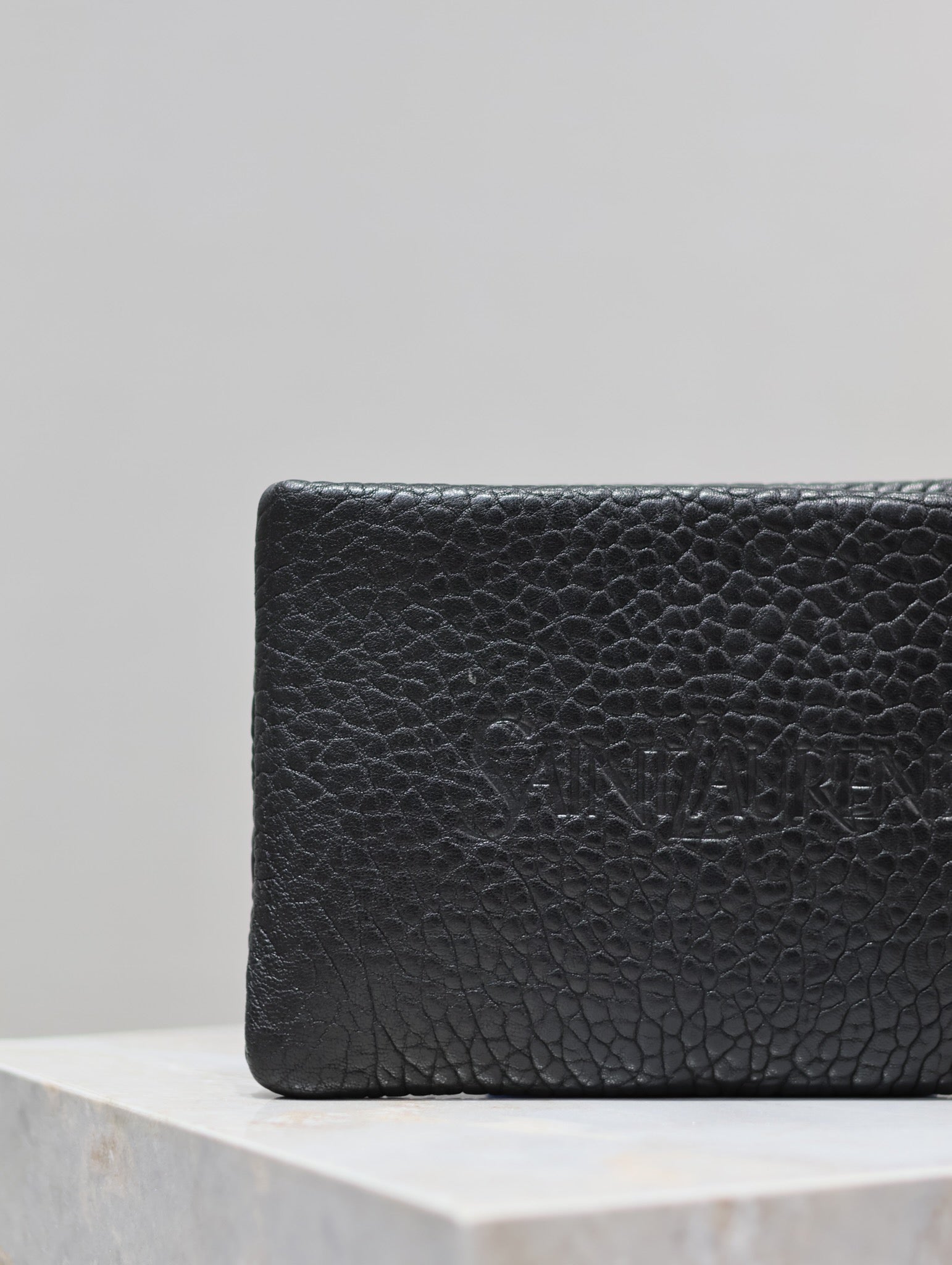 SAINT LAURENT POUCH WITH ELEPHANT TEXTURE 23 IN BLACK LAMBSKIN LOGO EMBOSSED