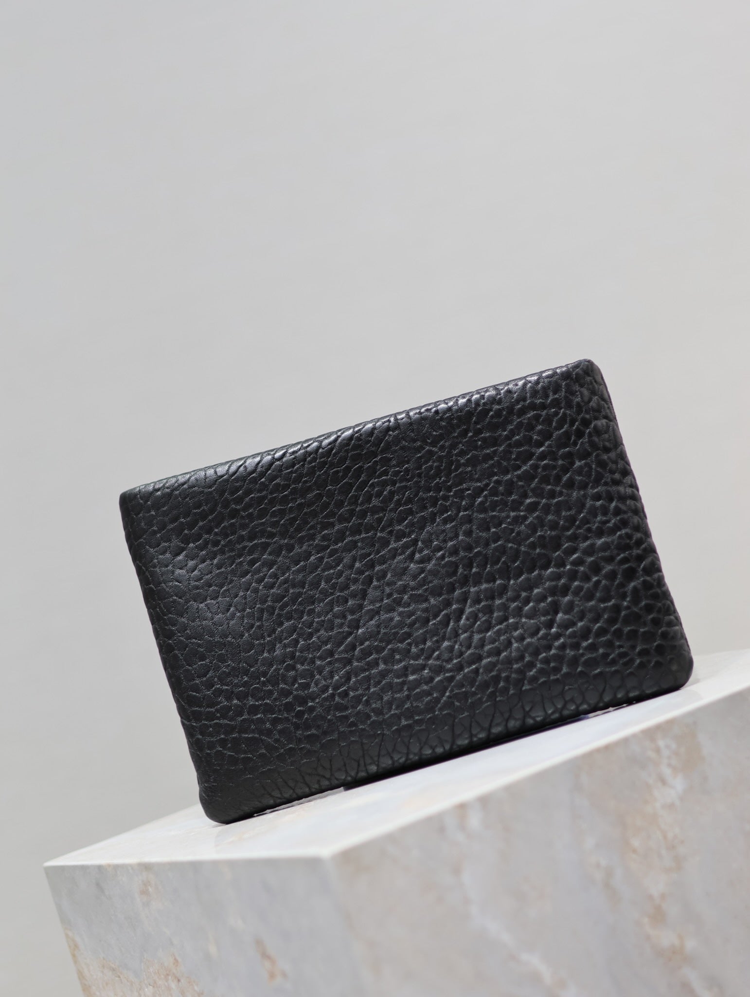 SAINT LAURENT POUCH WITH ELEPHANT TEXTURE 23 IN BLACK LAMBSKIN LOGO EMBOSSED