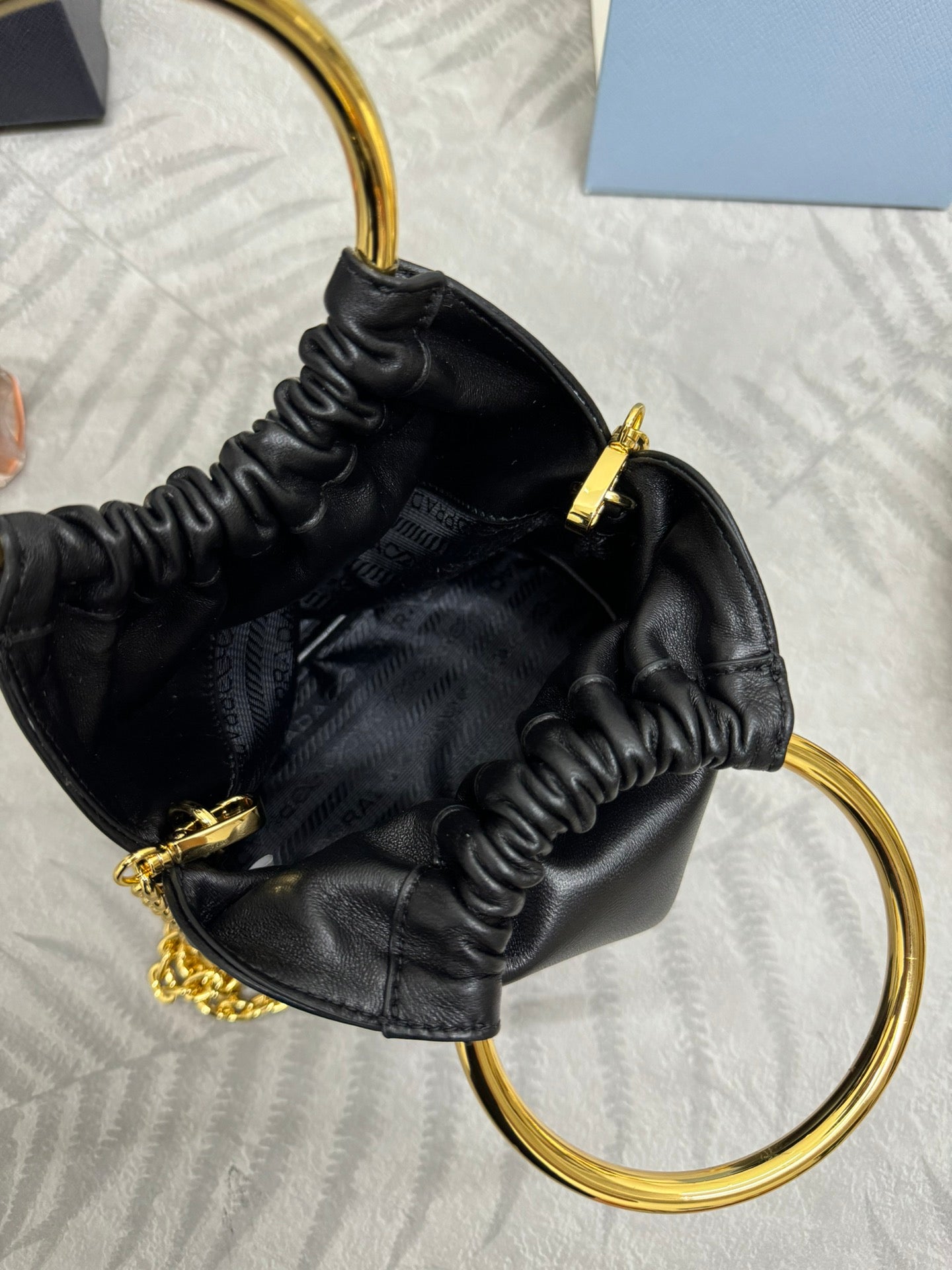PRADA MINI BUCKET BAG 19 IN BLACK SOFT NAPPA LAMBSKIN GOLD HARDWARE