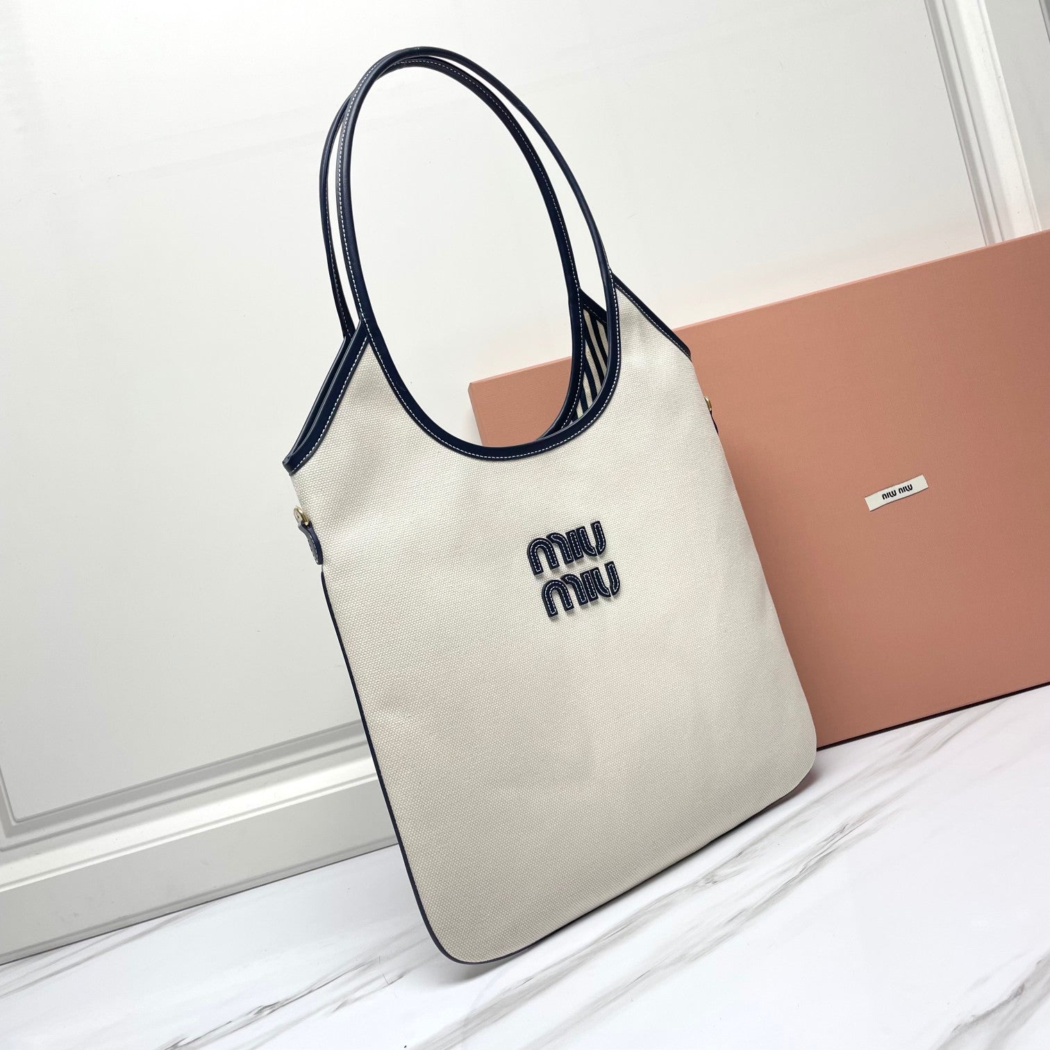 MIU MIU IVY TOTE BAG 40 IN WHITE CANVAS AND NAVY LEATHER TRIM