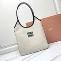 MIU MIU IVY TOTE BAG 40 IN WHITE CANVAS AND NAVY LEATHER TRIM