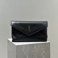 SAINT LAURENT ENVELOPE CLUTCH 29 IN BLACK LAMBSKIN COPPER LOGO