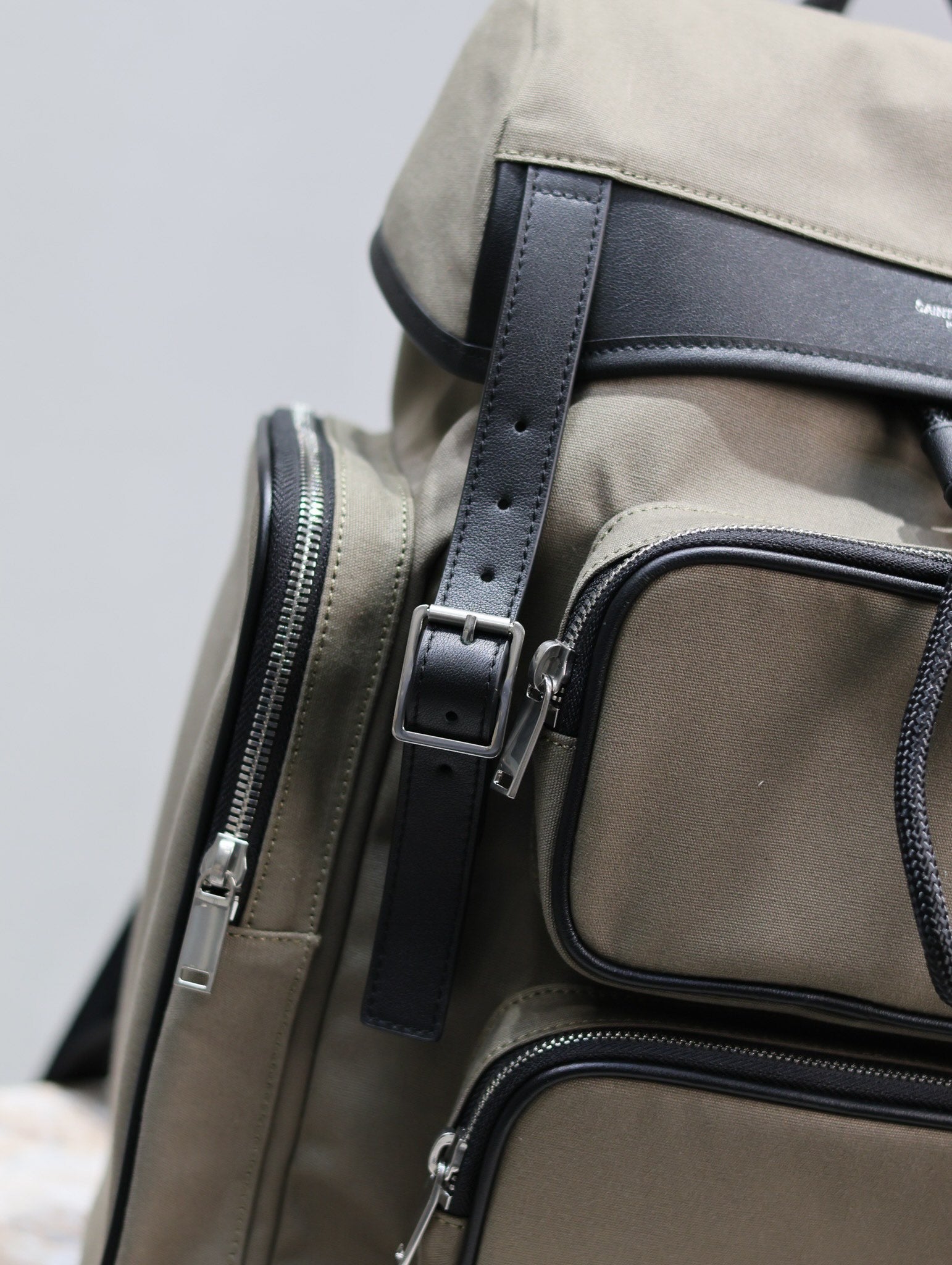 SAINT LAURENT CITY MULTI-POCKET BACKPACK 42 IN KHAKI GREEN NYLON AND BLACK SMOOTH CALFSKIN
