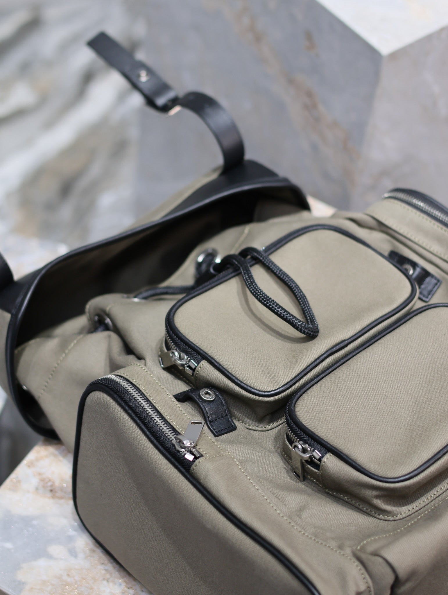 SAINT LAURENT CITY MULTI-POCKET BACKPACK 42 IN KHAKI GREEN NYLON AND BLACK SMOOTH CALFSKIN
