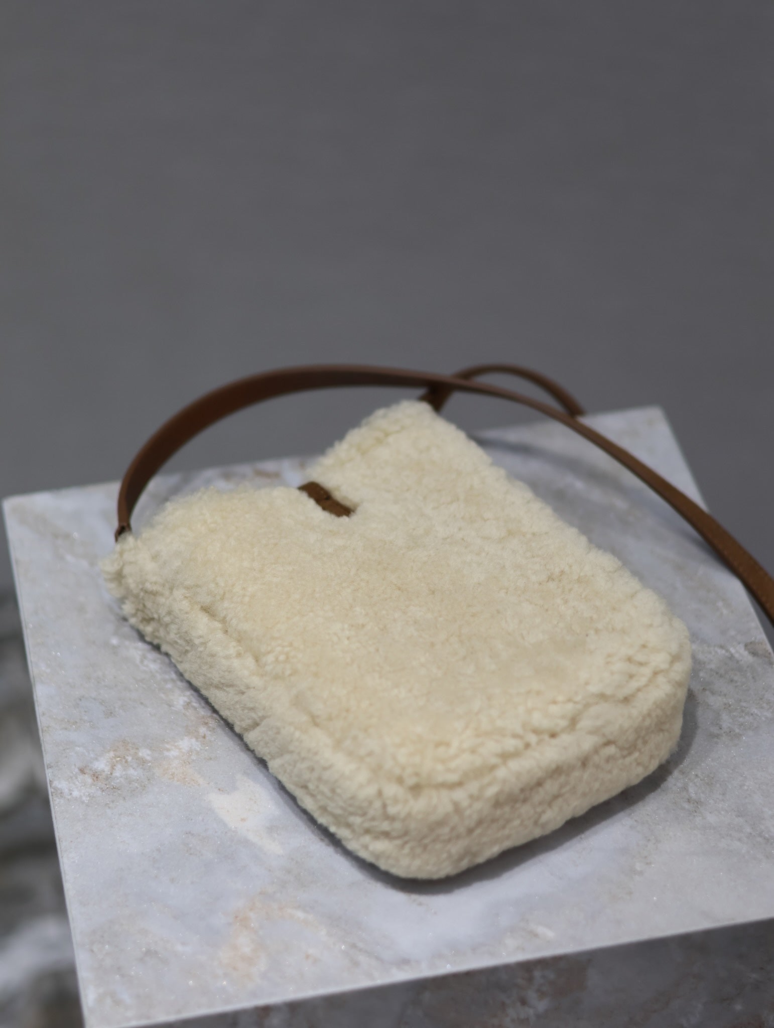 SAINT LAURENT LE 5 À 7 HOBO BAG 18 IN CREAM SHEARLING AND BROWN SUEDE TRIM