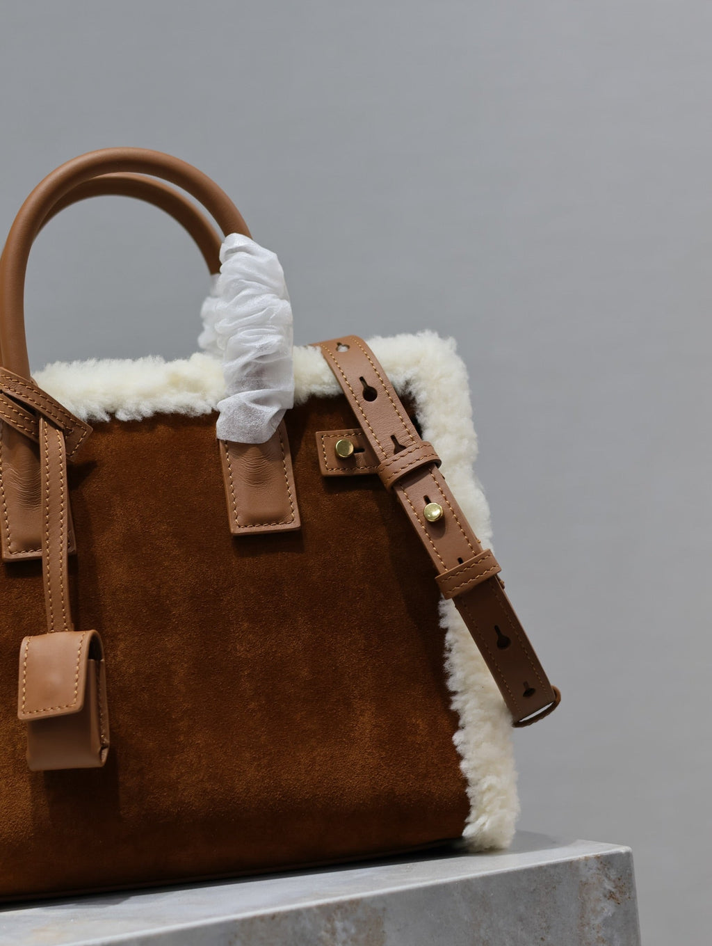 SAINT LAURENT SAC DE JOUR 26 IN BROWN SUEDE AND WHITE SHEARLING TRIM