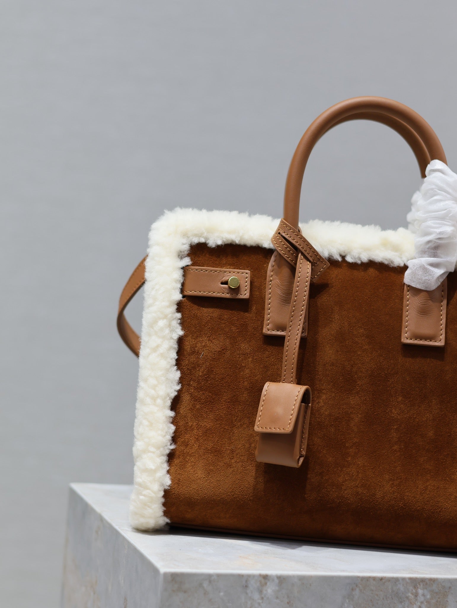 SAINT LAURENT SAC DE JOUR 26 IN BROWN SUEDE AND WHITE SHEARLING TRIM