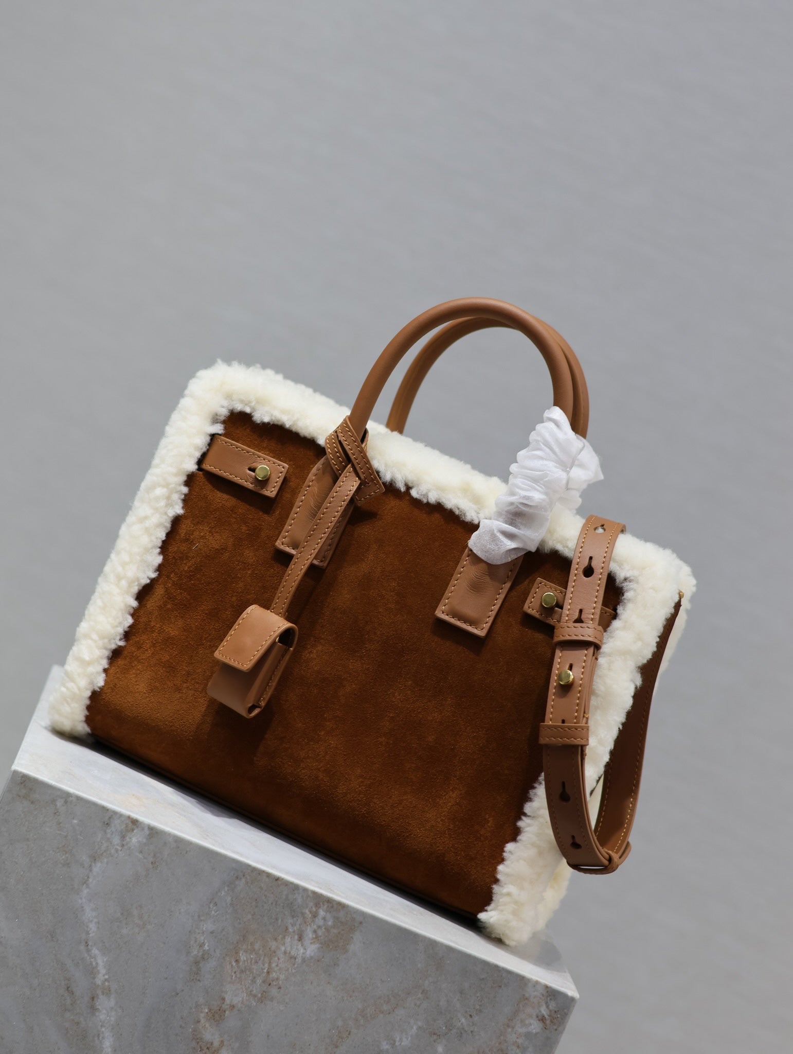 SAINT LAURENT SAC DE JOUR 26 IN BROWN SUEDE AND WHITE SHEARLING TRIM