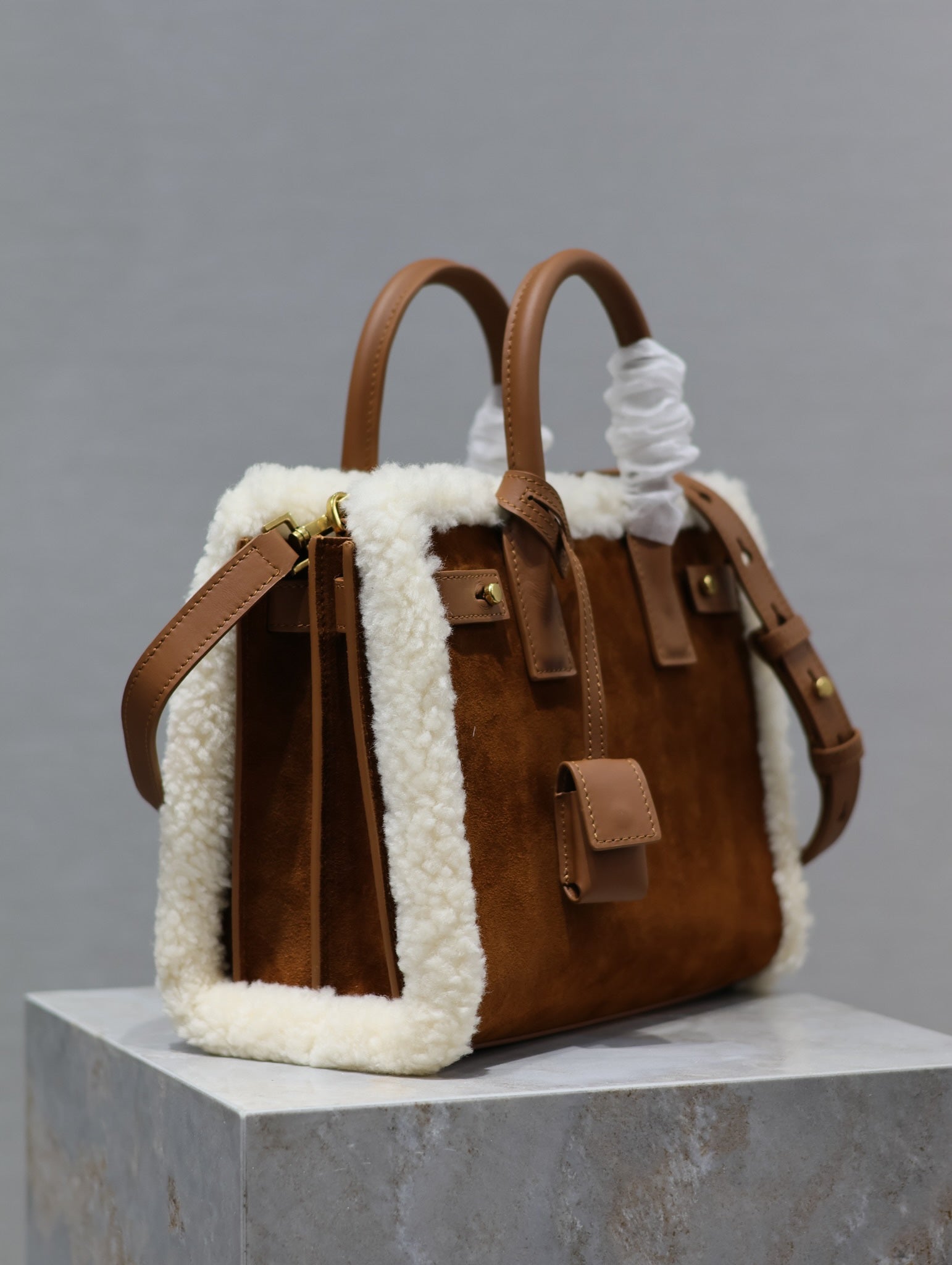 SAINT LAURENT SAC DE JOUR 26 IN BROWN SUEDE AND WHITE SHEARLING TRIM