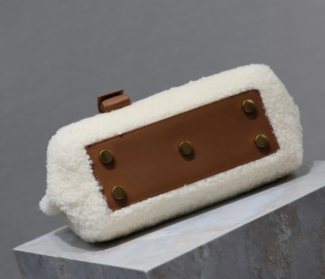 SAINT LAURENT SAC DE JOUR 22 IN WHITE SHEARLING AND BROWN CALFSKIN TRIM