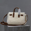 SAINT LAURENT SAC DE JOUR 22 IN WHITE SHEARLING AND BROWN CALFSKIN TRIM