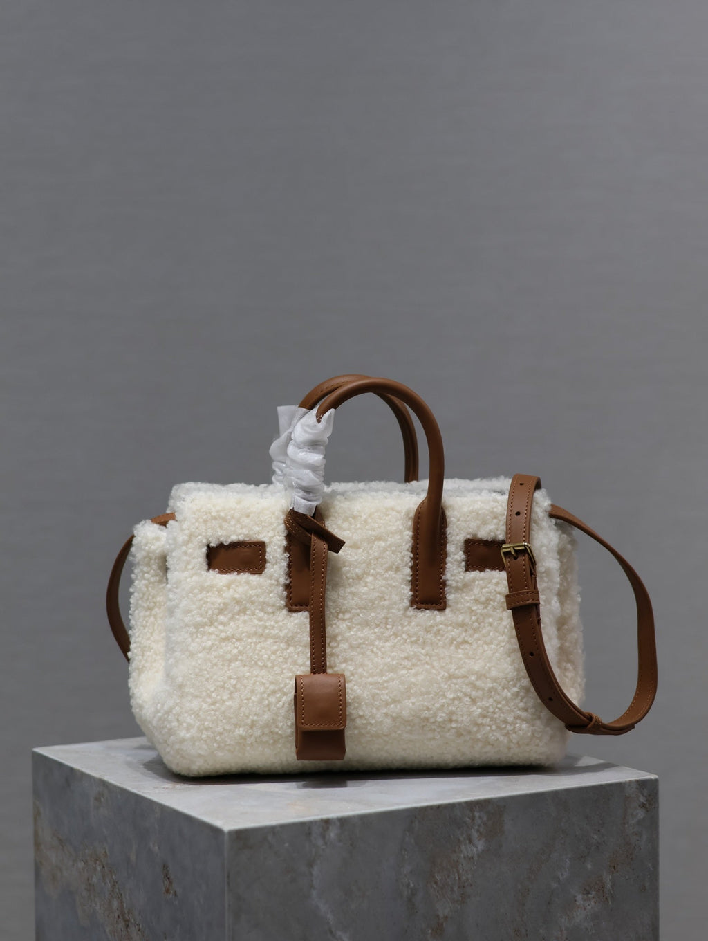 SAINT LAURENT SAC DE JOUR 22 IN WHITE SHEARLING AND BROWN CALFSKIN TRIM