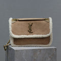 SAINT LAURENT NIKI MEDIUM 28 IN CAMEL SUEDE AND WHITE SHEARLING