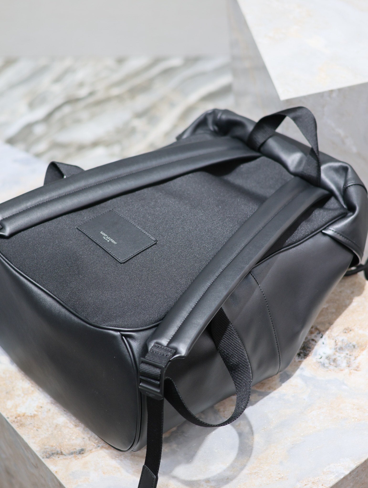 SAINT LAURENT BACKPACK 45 IN BLACK CALFSKIN WITH EMBOSSED LOGO