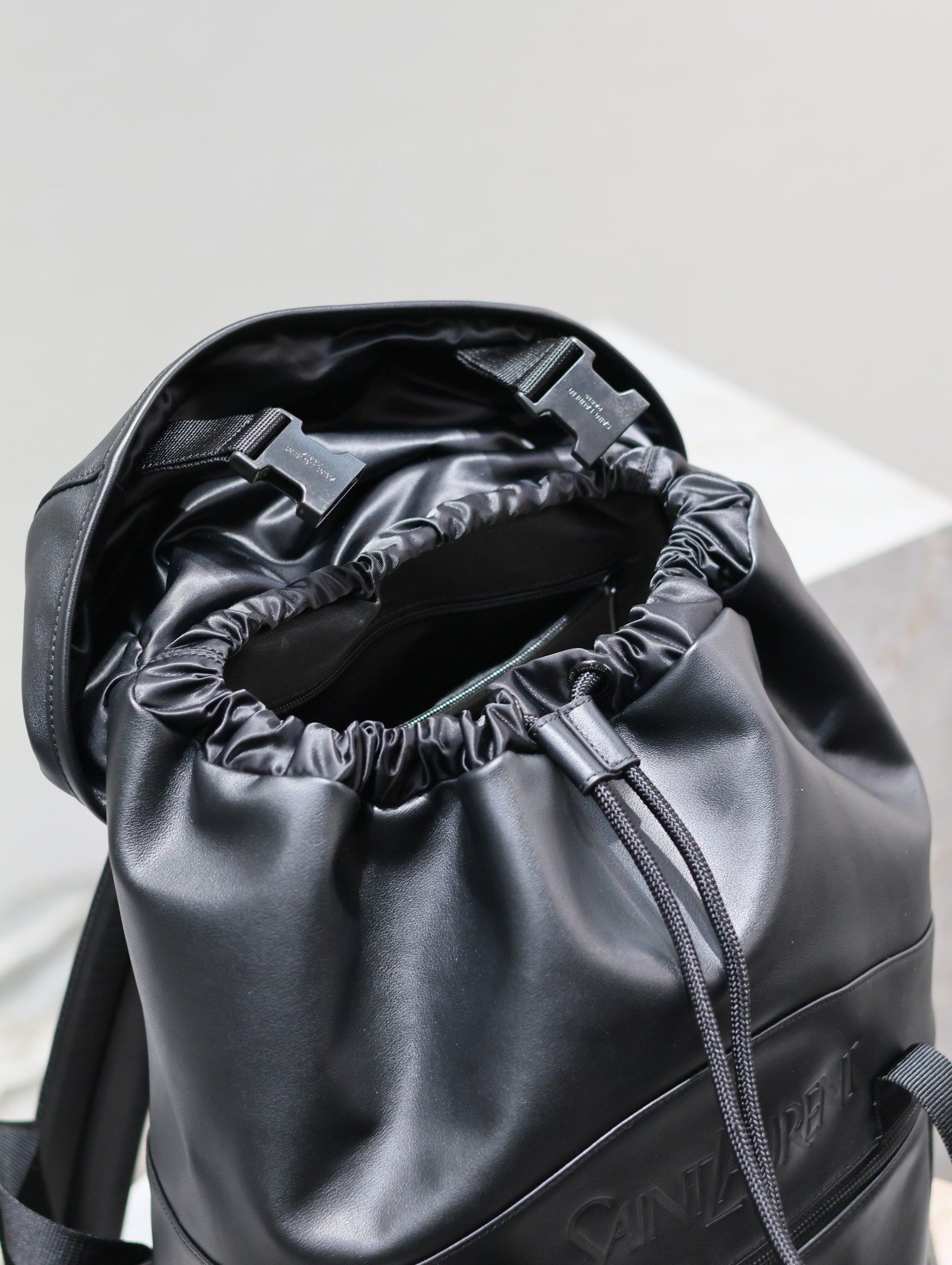 SAINT LAURENT BACKPACK 45 IN BLACK CALFSKIN WITH EMBOSSED LOGO