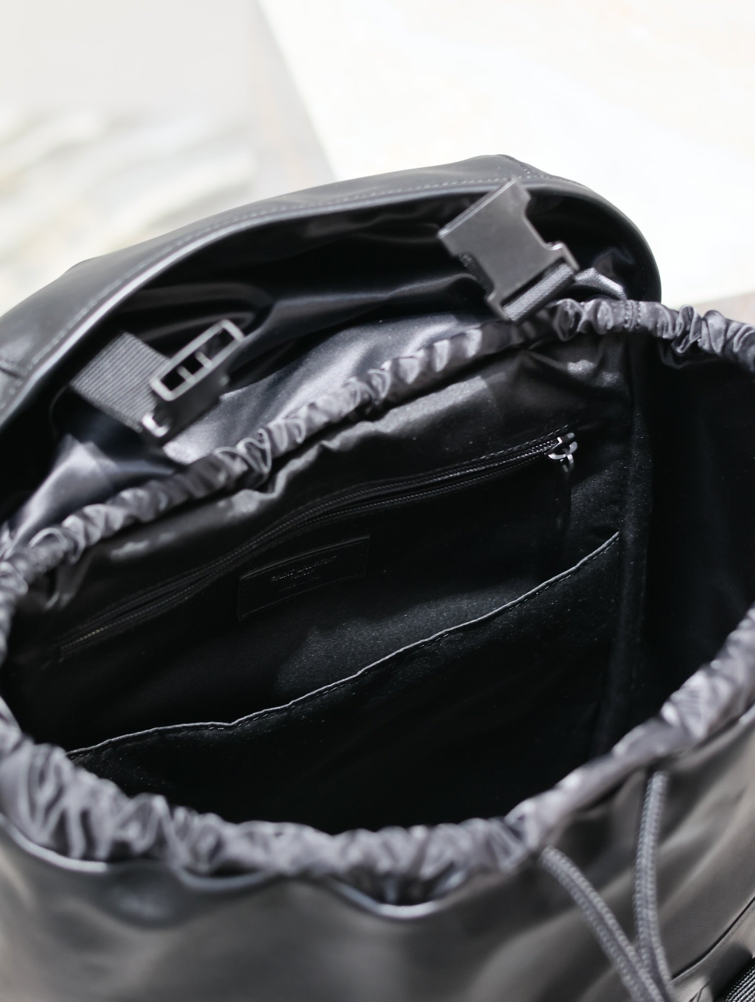 SAINT LAURENT BACKPACK 45 IN BLACK CALFSKIN WITH EMBOSSED LOGO