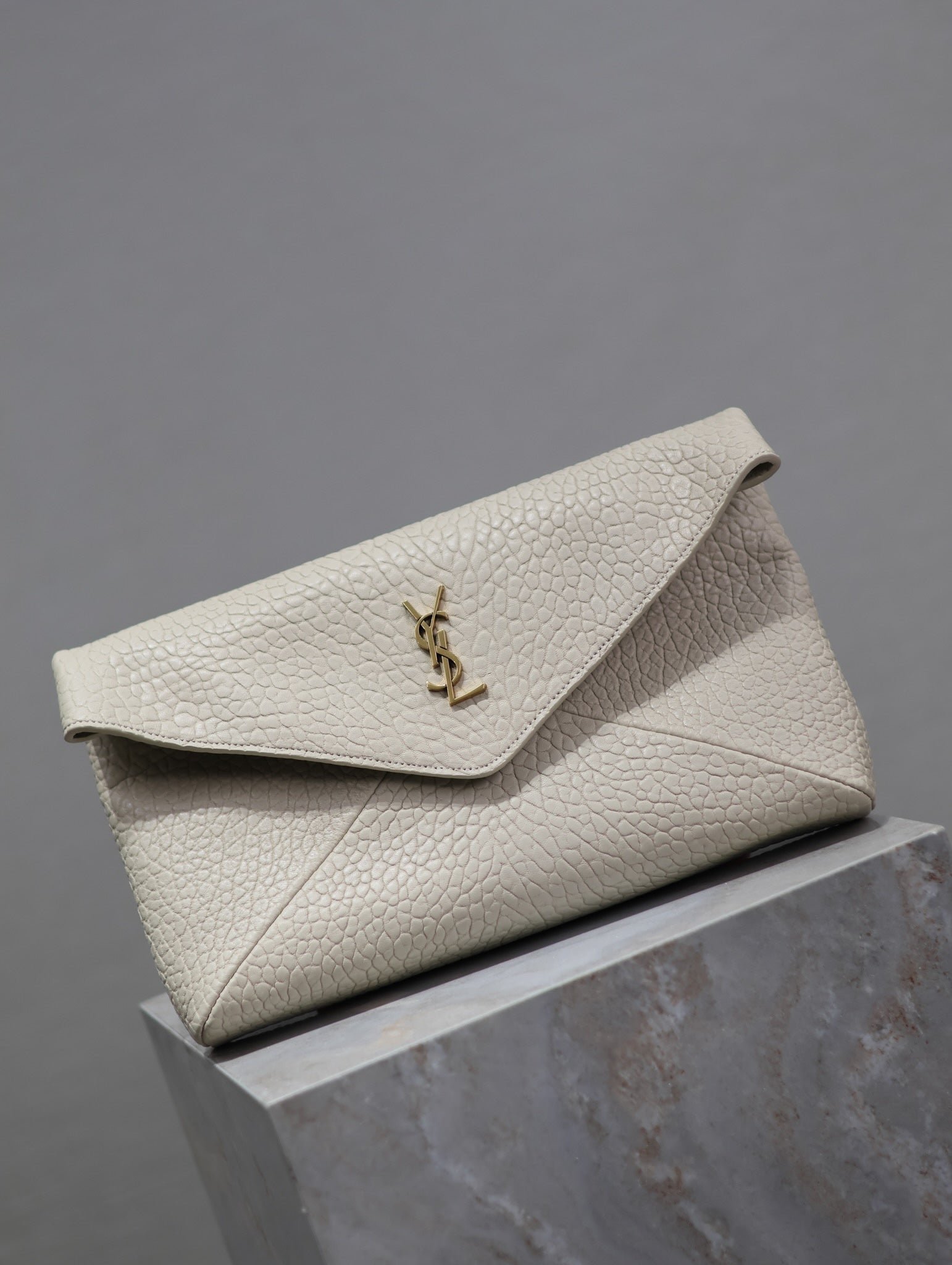 SAINT LAURENT ENVELOPE CLUTCH 29 IN WHITE LAMBSKIN COPPER LOGO