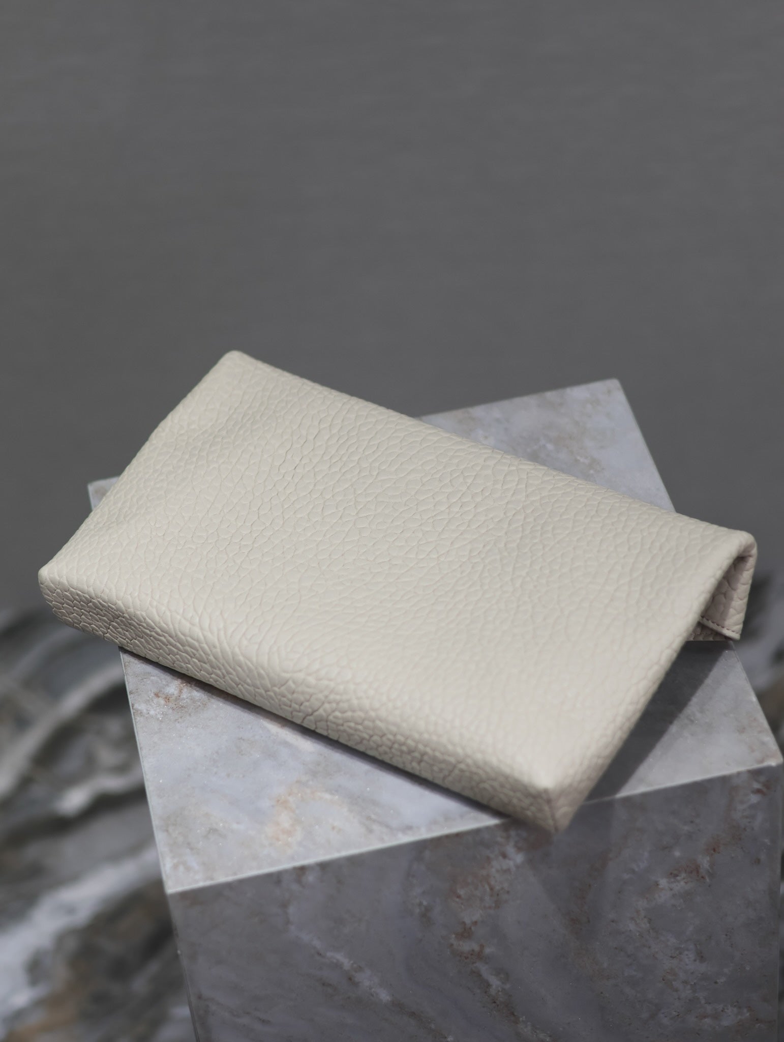 SAINT LAURENT ENVELOPE CLUTCH 29 IN WHITE LAMBSKIN COPPER LOGO
