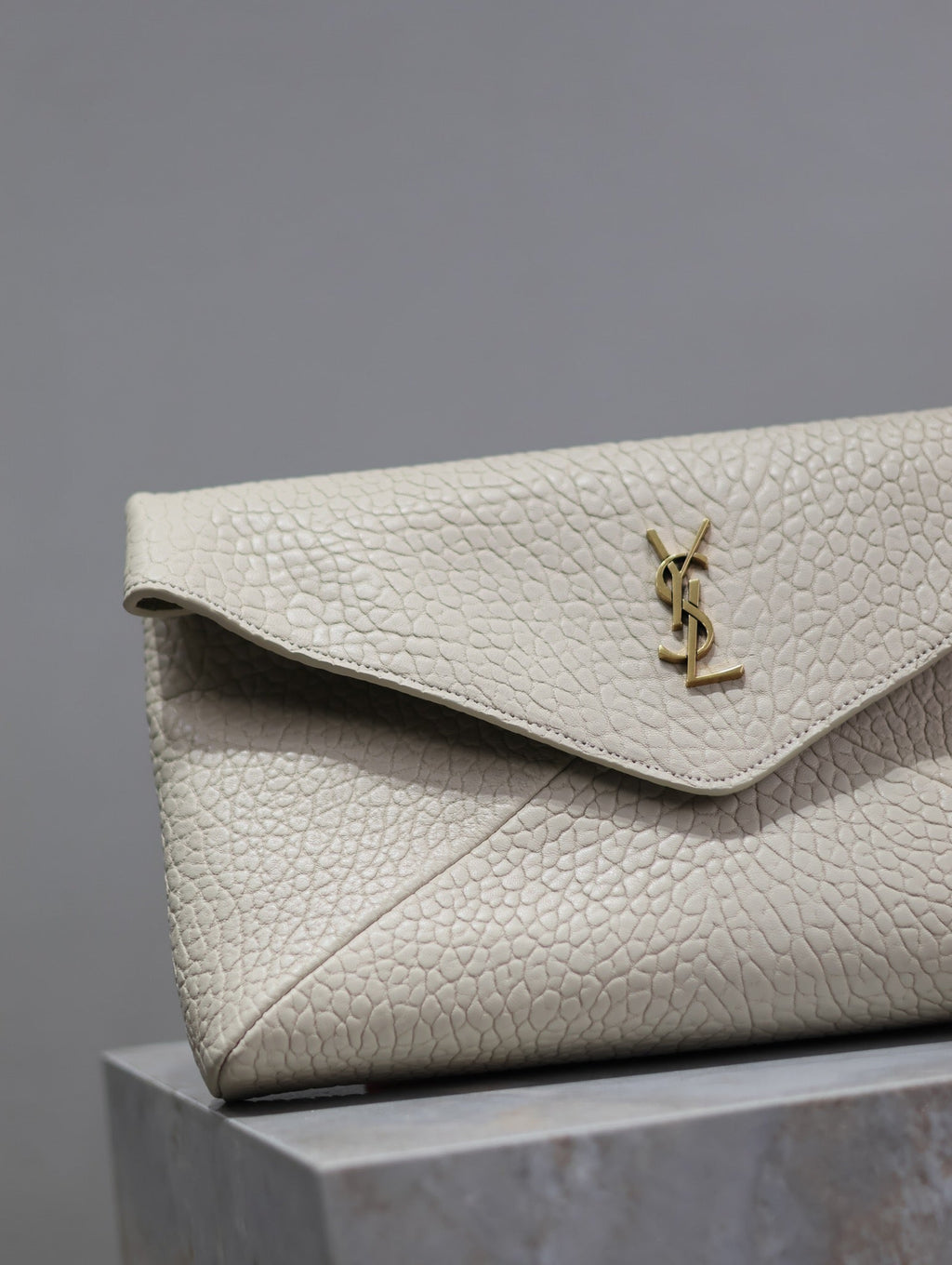 SAINT LAURENT ENVELOPE CLUTCH 29 IN WHITE LAMBSKIN COPPER LOGO