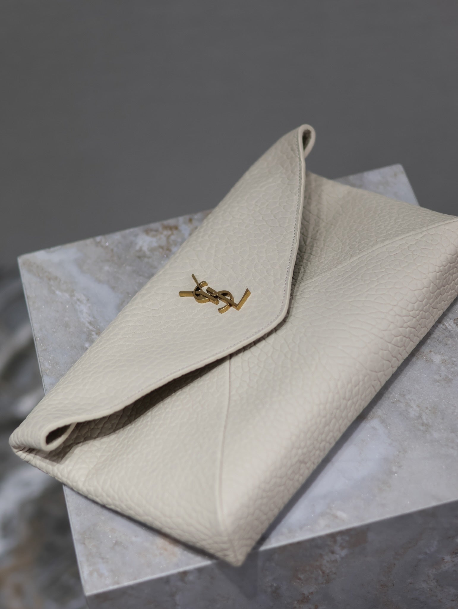 SAINT LAURENT ENVELOPE CLUTCH 29 IN WHITE LAMBSKIN COPPER LOGO
