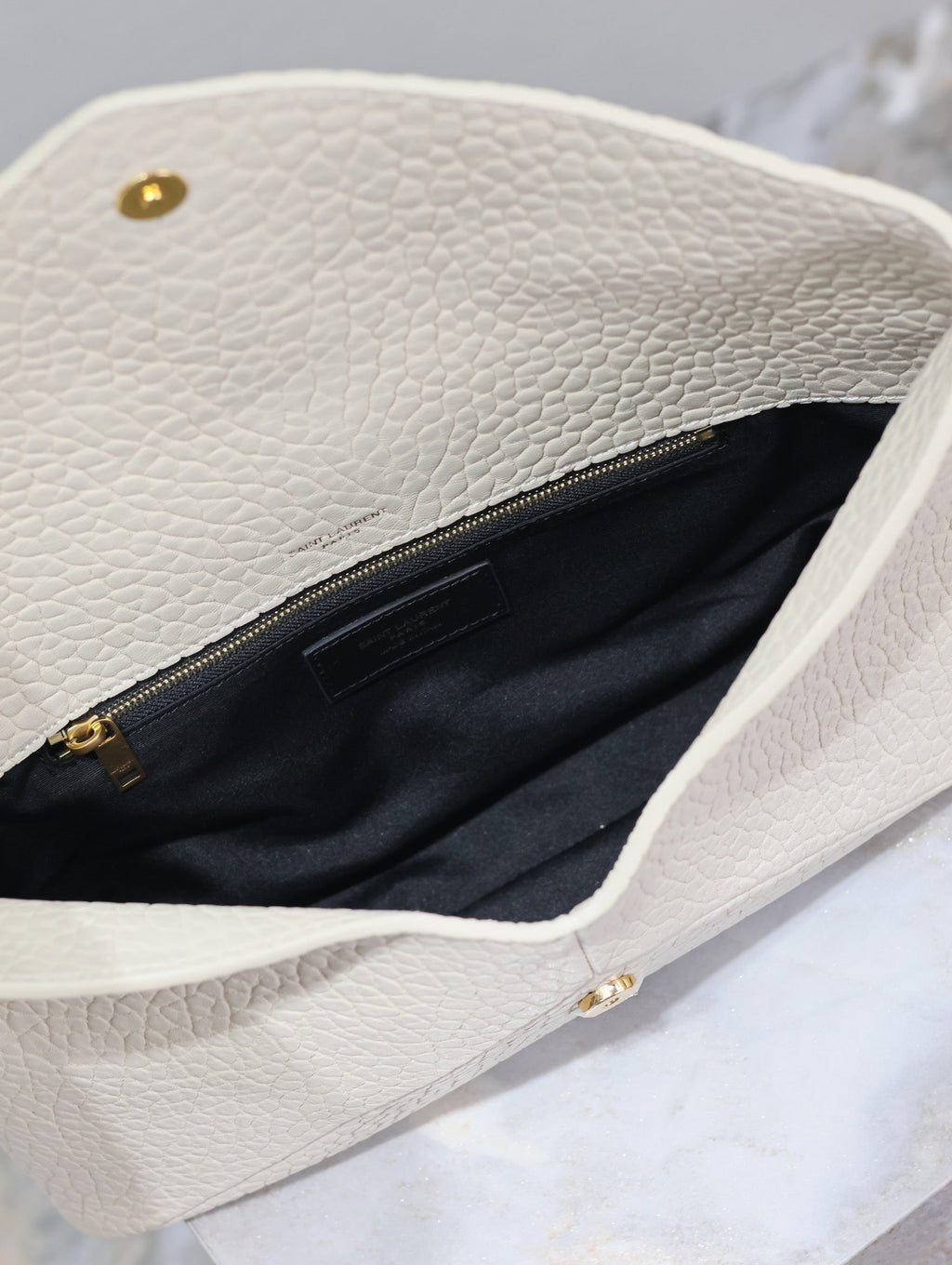 SAINT LAURENT ENVELOPE CLUTCH 29 IN WHITE LAMBSKIN COPPER LOGO
