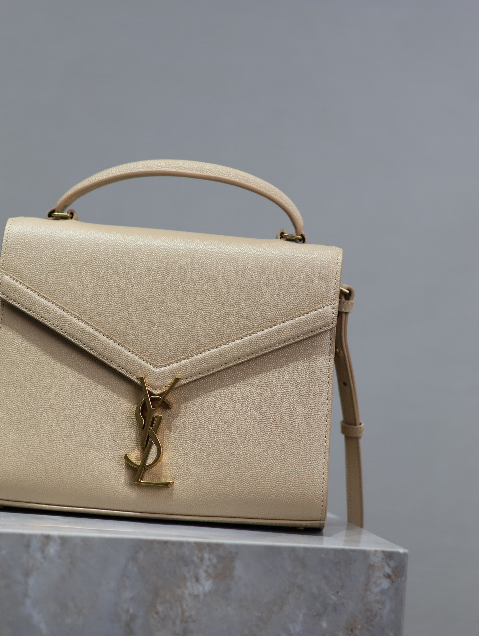 SAINT LAURENT CASSANDRA TOP HANDLE BAG 24 IN BEIGE CALFSKIN GOLD HARDWARE