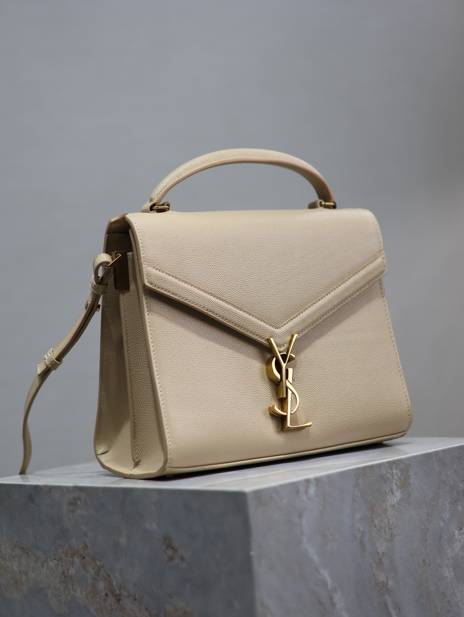 SAINT LAURENT CASSANDRA TOP HANDLE BAG 24 IN BEIGE CALFSKIN GOLD HARDWARE