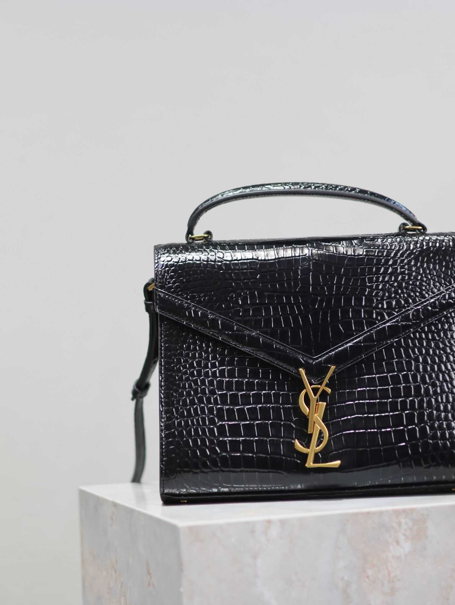 SAINT LAURENT CASSANDRA TOP HANDLE BAG 24 IN BLACK CROCODILE-EMBOSSED GLOSSY CALFSKIN