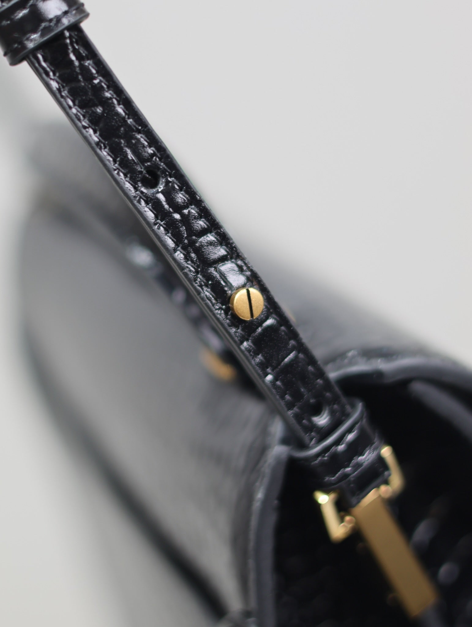 SAINT LAURENT CASSANDRA TOP HANDLE BAG 24 IN BLACK CROCODILE-EMBOSSED GLOSSY CALFSKIN