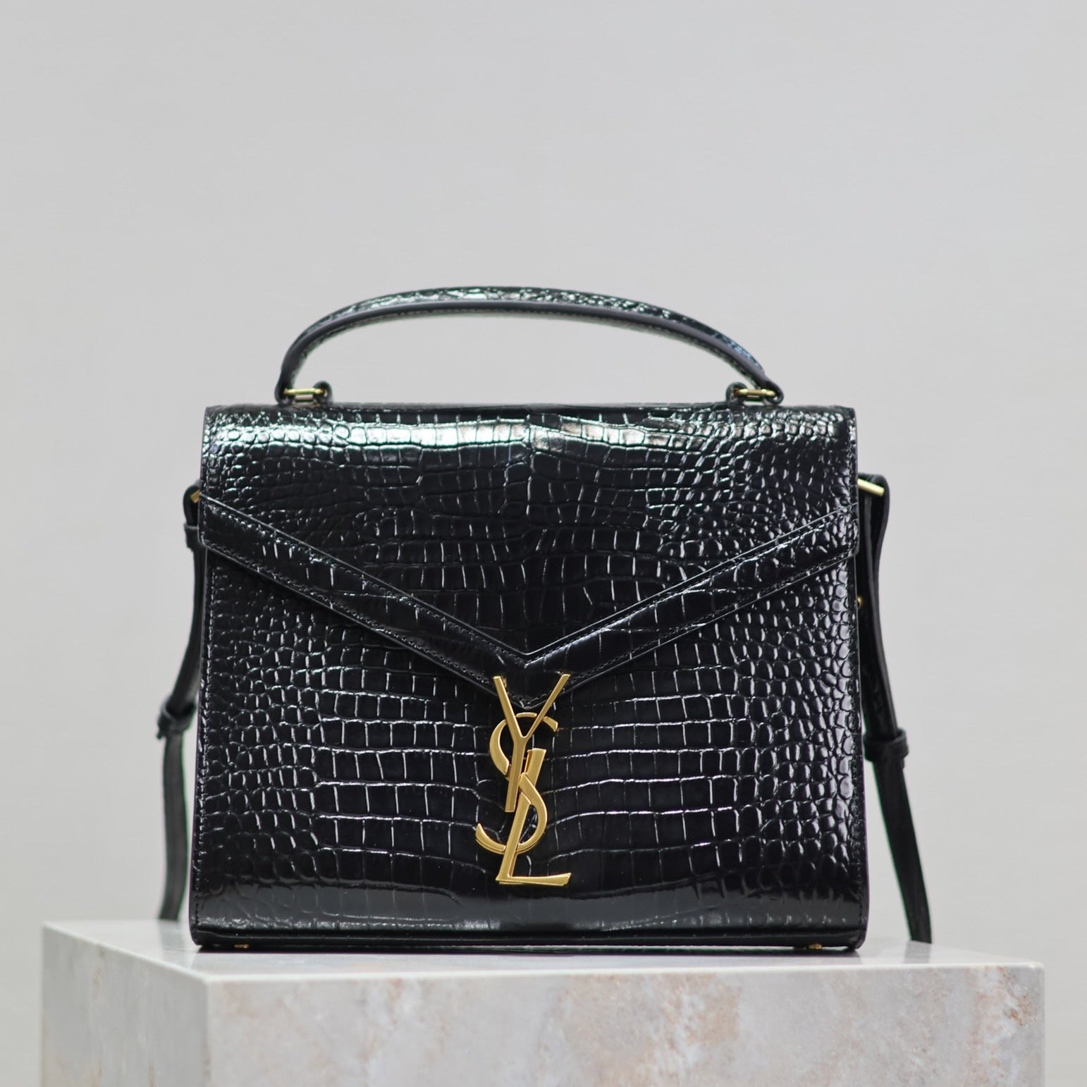 SAINT LAURENT CASSANDRA TOP HANDLE BAG 24 IN BLACK CROCODILE-EMBOSSED GLOSSY CALFSKIN