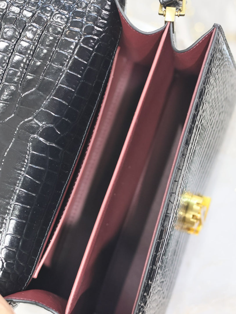SAINT LAURENT CASSANDRA TOP HANDLE BAG 24 IN BLACK CROCODILE-EMBOSSED GLOSSY CALFSKIN