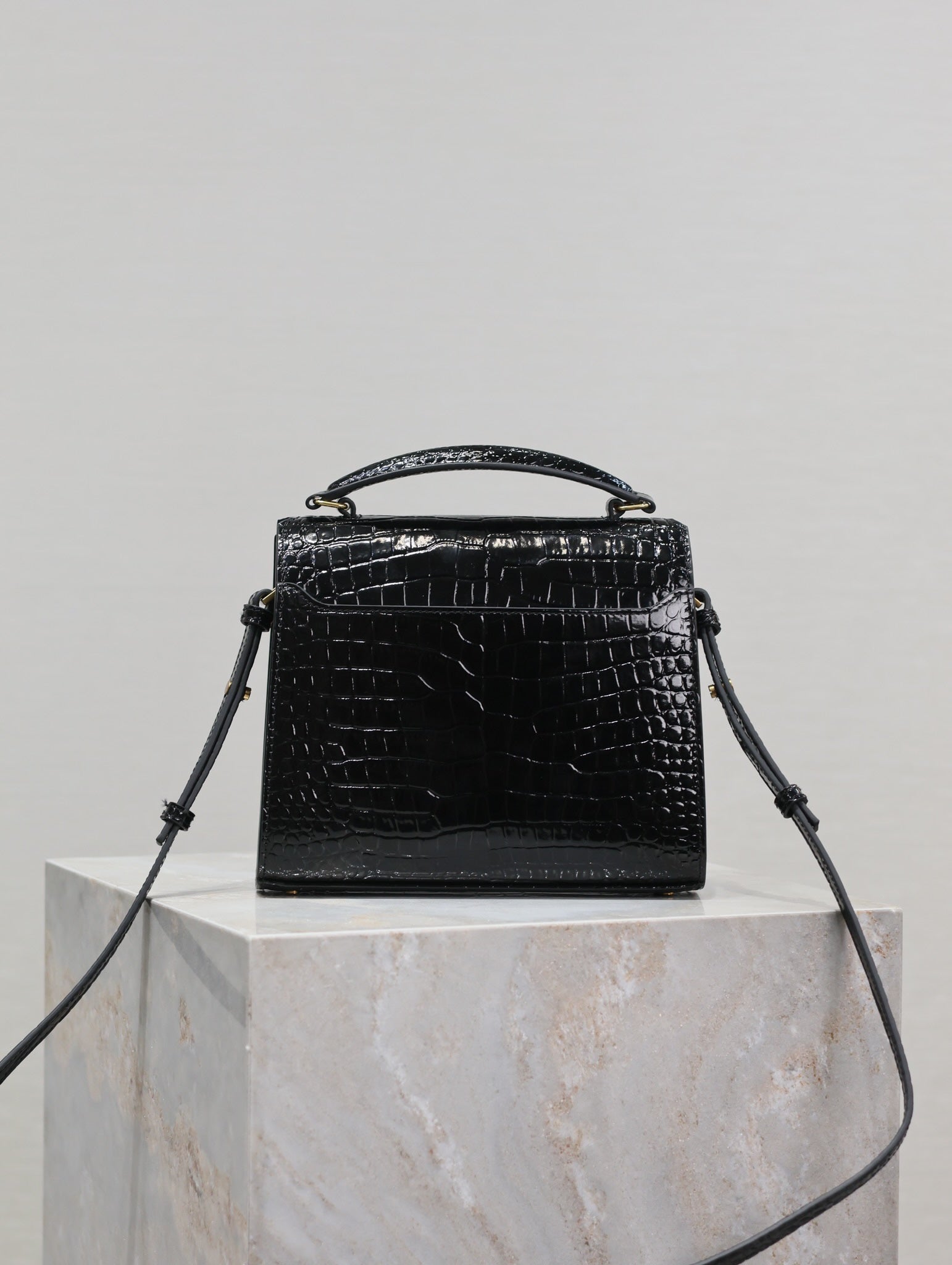 SAINT LAURENT CASSANDRA MINI TOP HANDLE BAG 20 IN BLACK CROCODILE-EMBOSSED GLOSSY CALFSKIN