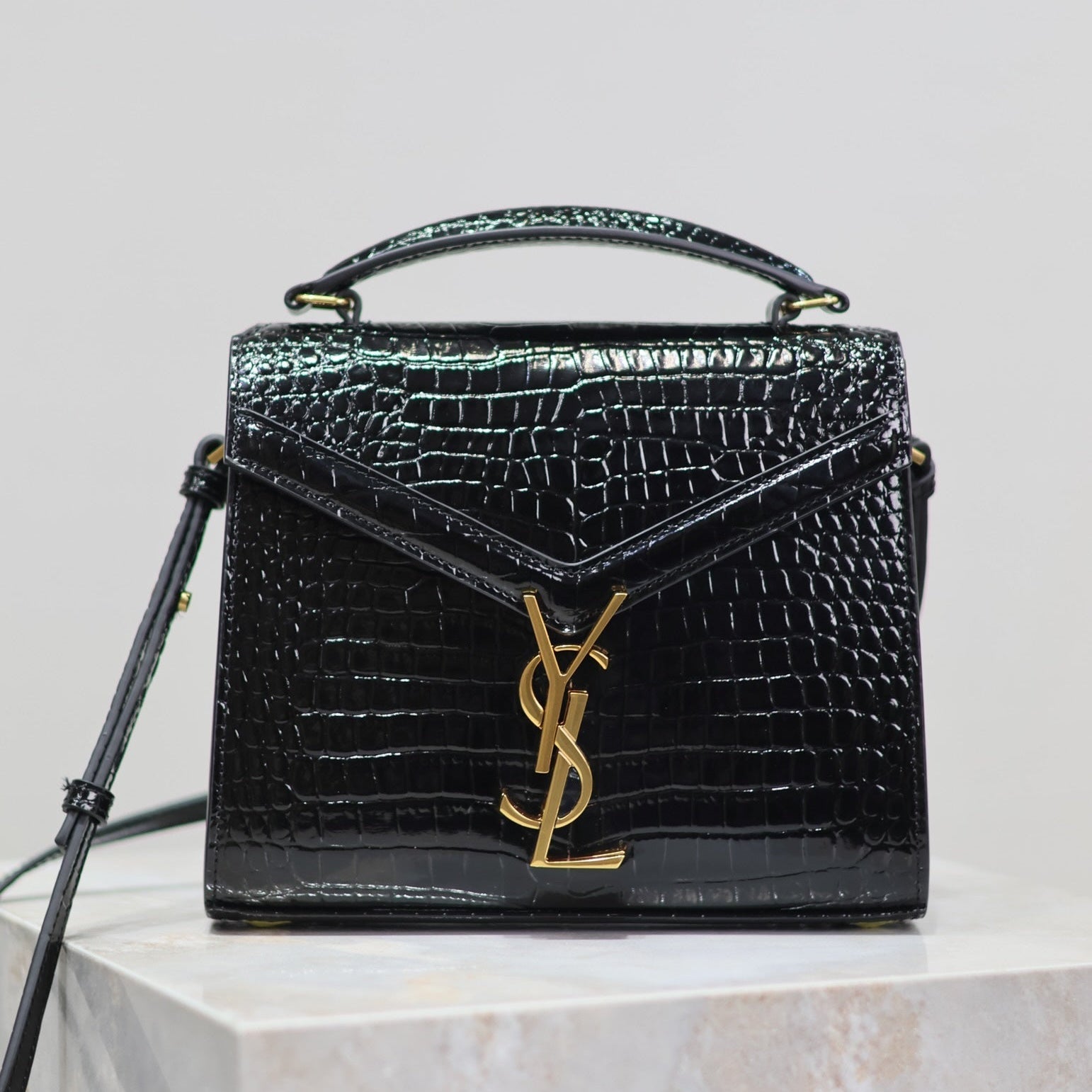 SAINT LAURENT CASSANDRA MINI TOP HANDLE BAG 20 IN BLACK CROCODILE-EMBOSSED GLOSSY CALFSKIN