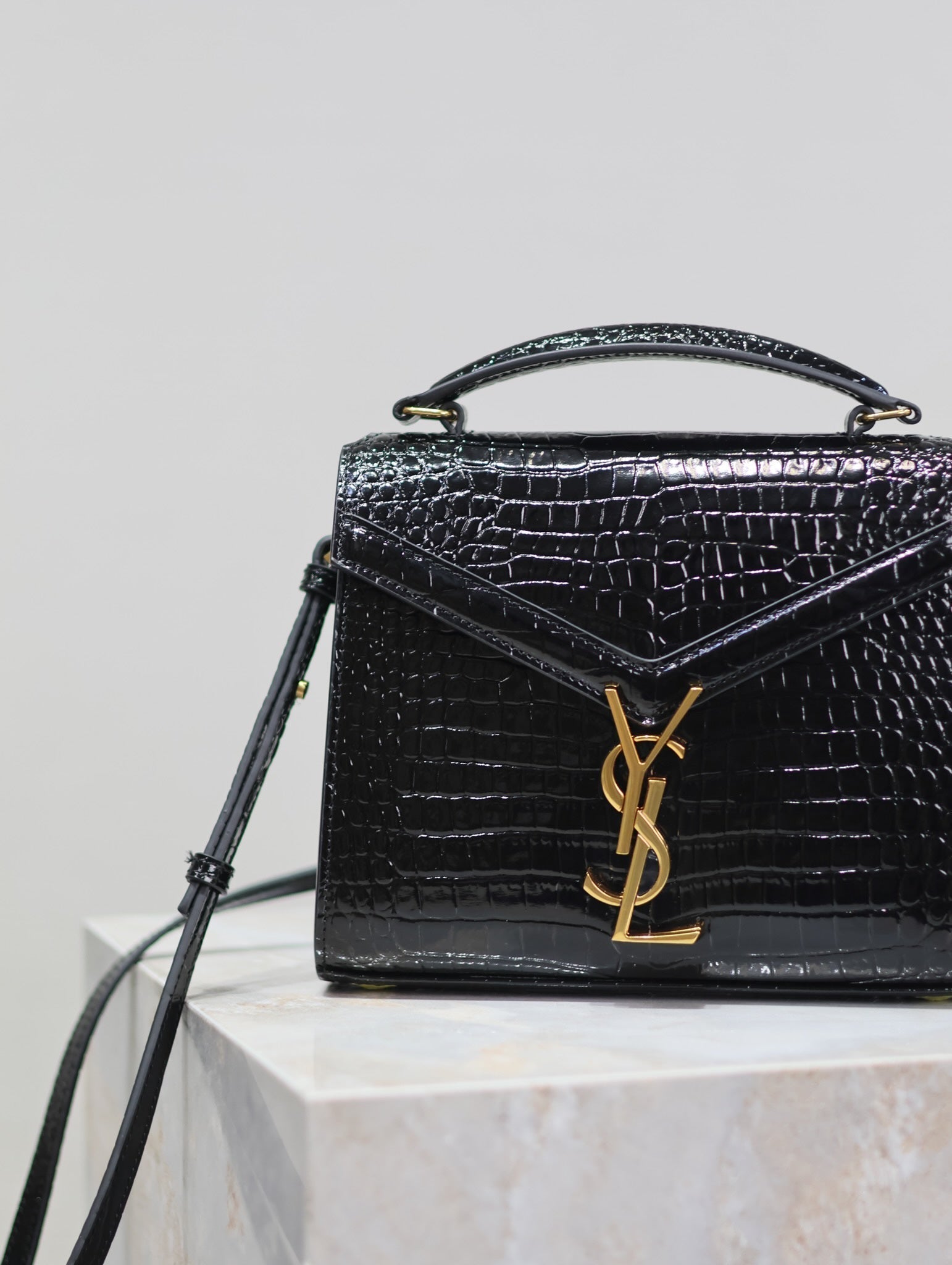 SAINT LAURENT CASSANDRA MINI TOP HANDLE BAG 20 IN BLACK CROCODILE-EMBOSSED GLOSSY CALFSKIN