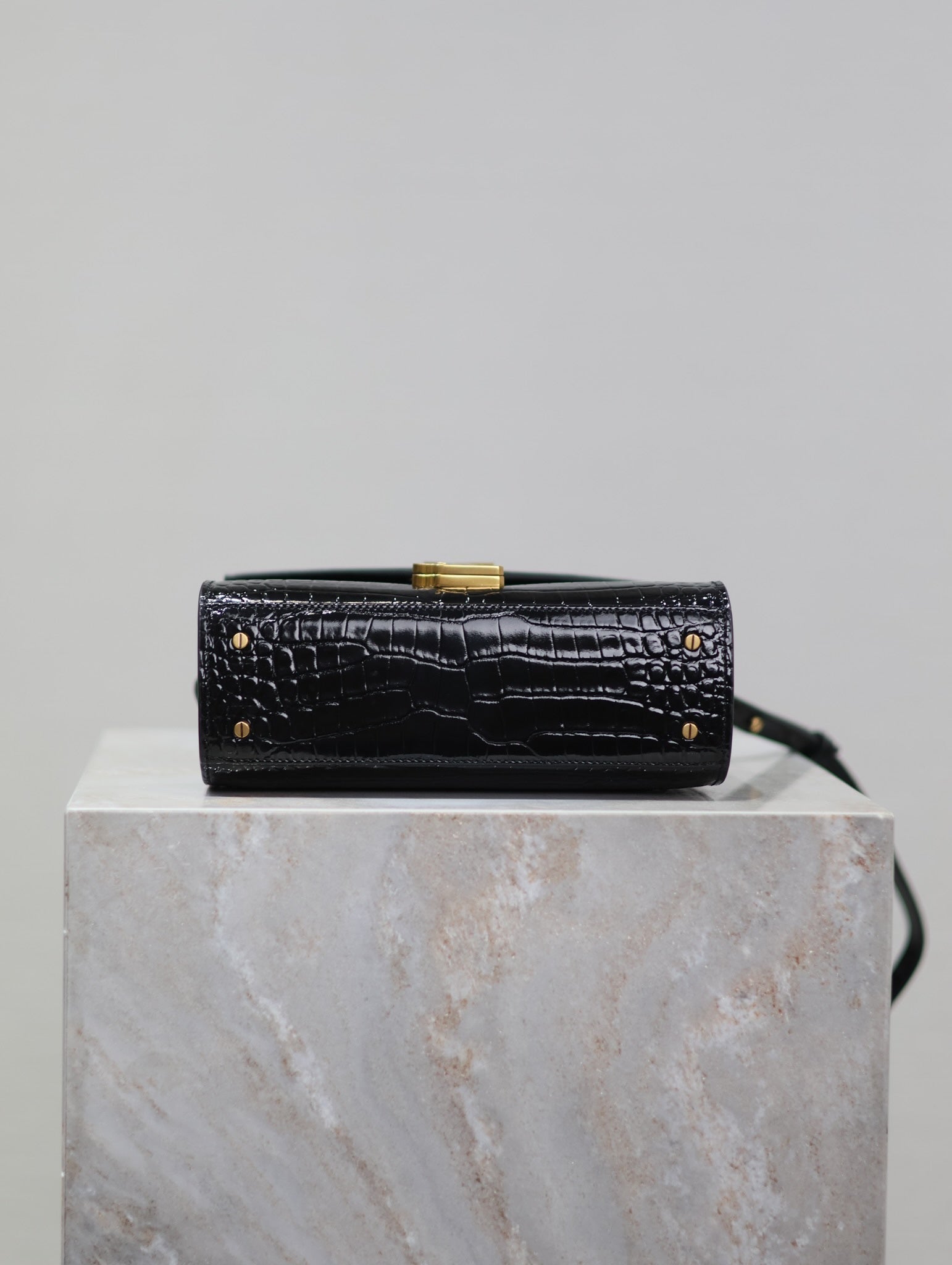 SAINT LAURENT CASSANDRA MINI TOP HANDLE BAG 20 IN BLACK CROCODILE-EMBOSSED GLOSSY CALFSKIN