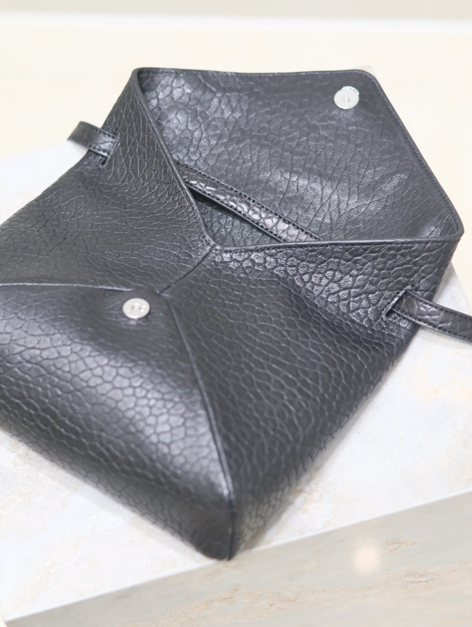 SAINT LAURENT ENVELOPE CHAIN BAG 23 IN BLACK ELEPHANT TEXTURE LAMBSKIN SILVER LOGO