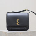 SAINT LAURENT NIKI BABY 22 IN CHARCOAL GRAY CALFSKIN GOLD LOGO