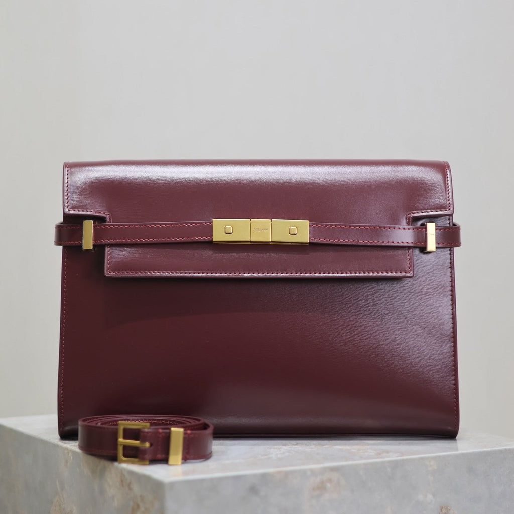 SAINT LAURENT MANHATTAN MEDIUM 29 IN WINE RED SMOOTH CALFSKIN GOLD BUCKLE