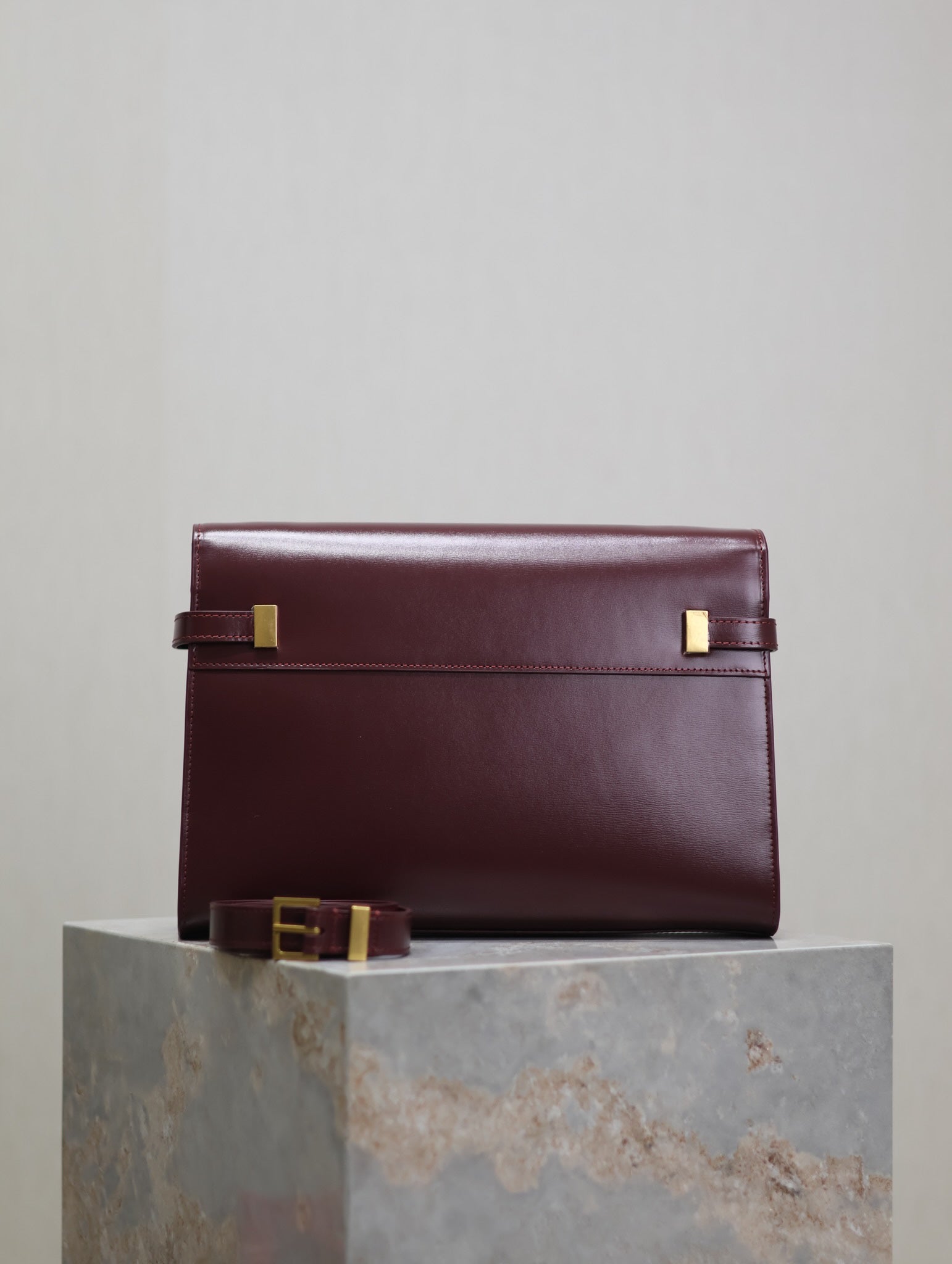 SAINT LAURENT MANHATTAN MEDIUM 29 IN WINE RED SMOOTH CALFSKIN GOLD BUCKLE