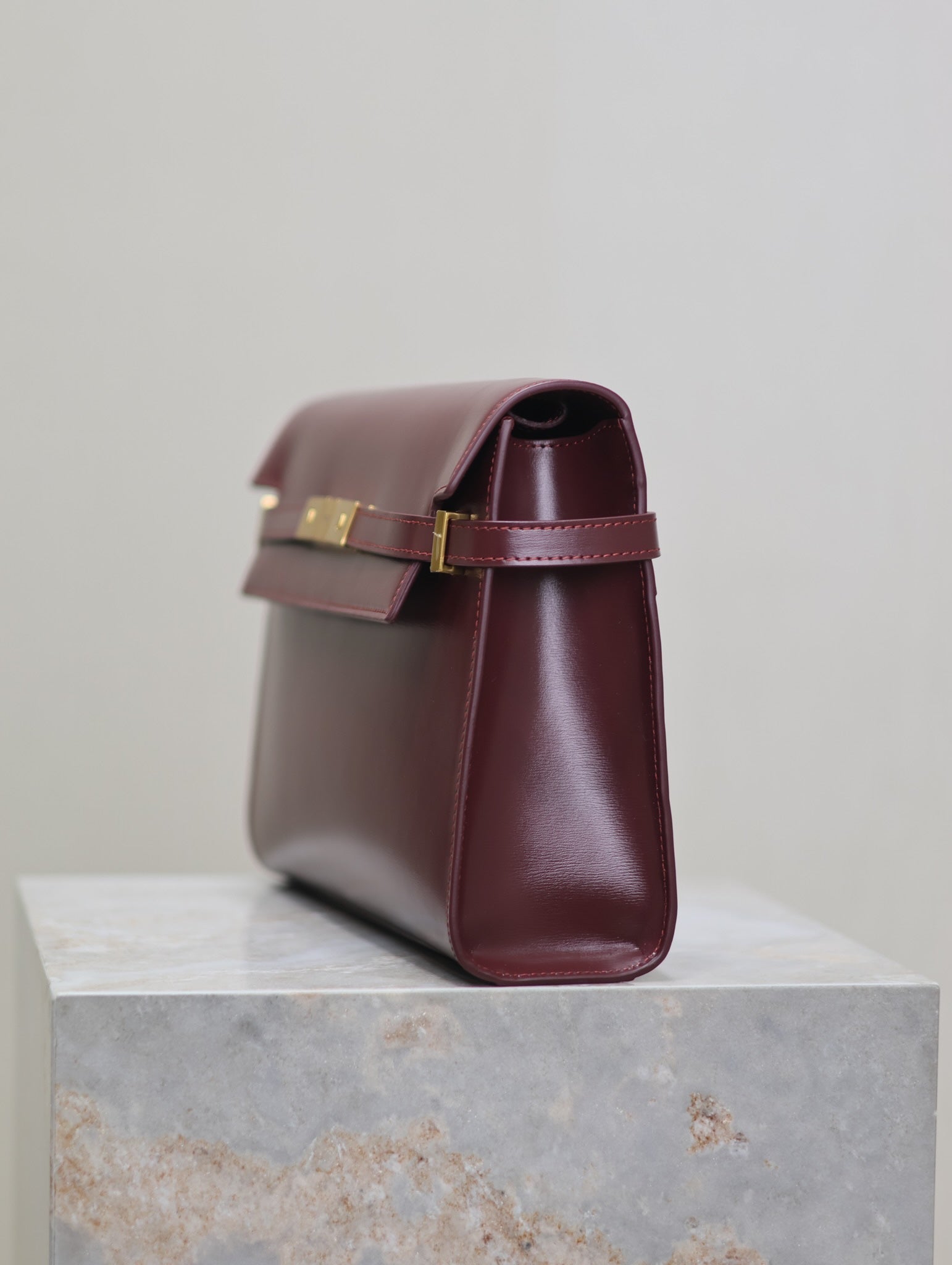 SAINT LAURENT MANHATTAN MEDIUM 29 IN WINE RED SMOOTH CALFSKIN GOLD BUCKLE