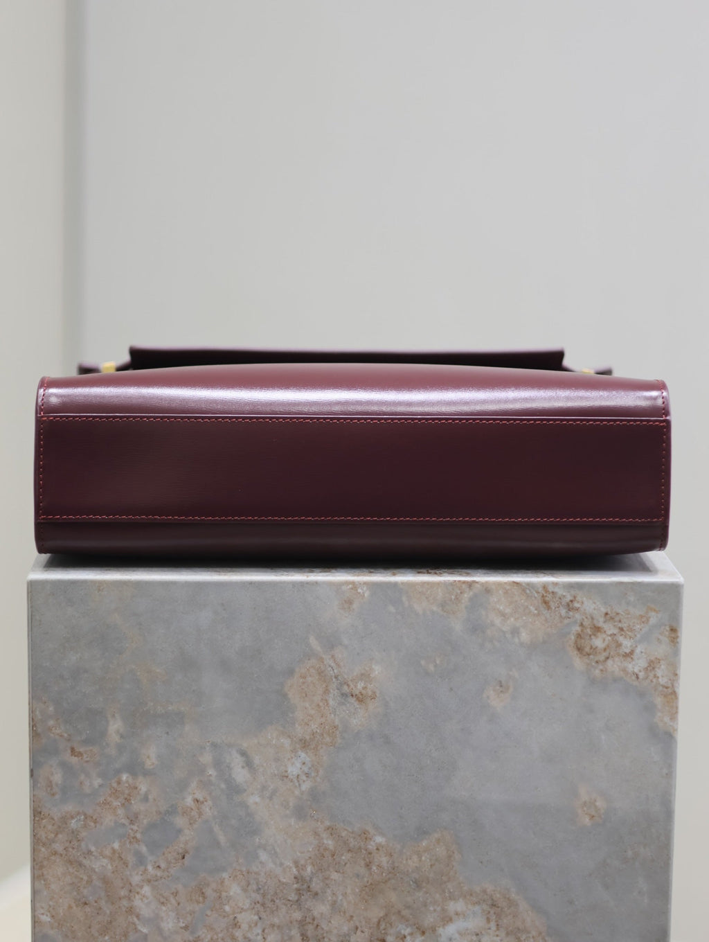 SAINT LAURENT MANHATTAN MEDIUM 29 IN WINE RED SMOOTH CALFSKIN GOLD BUCKLE