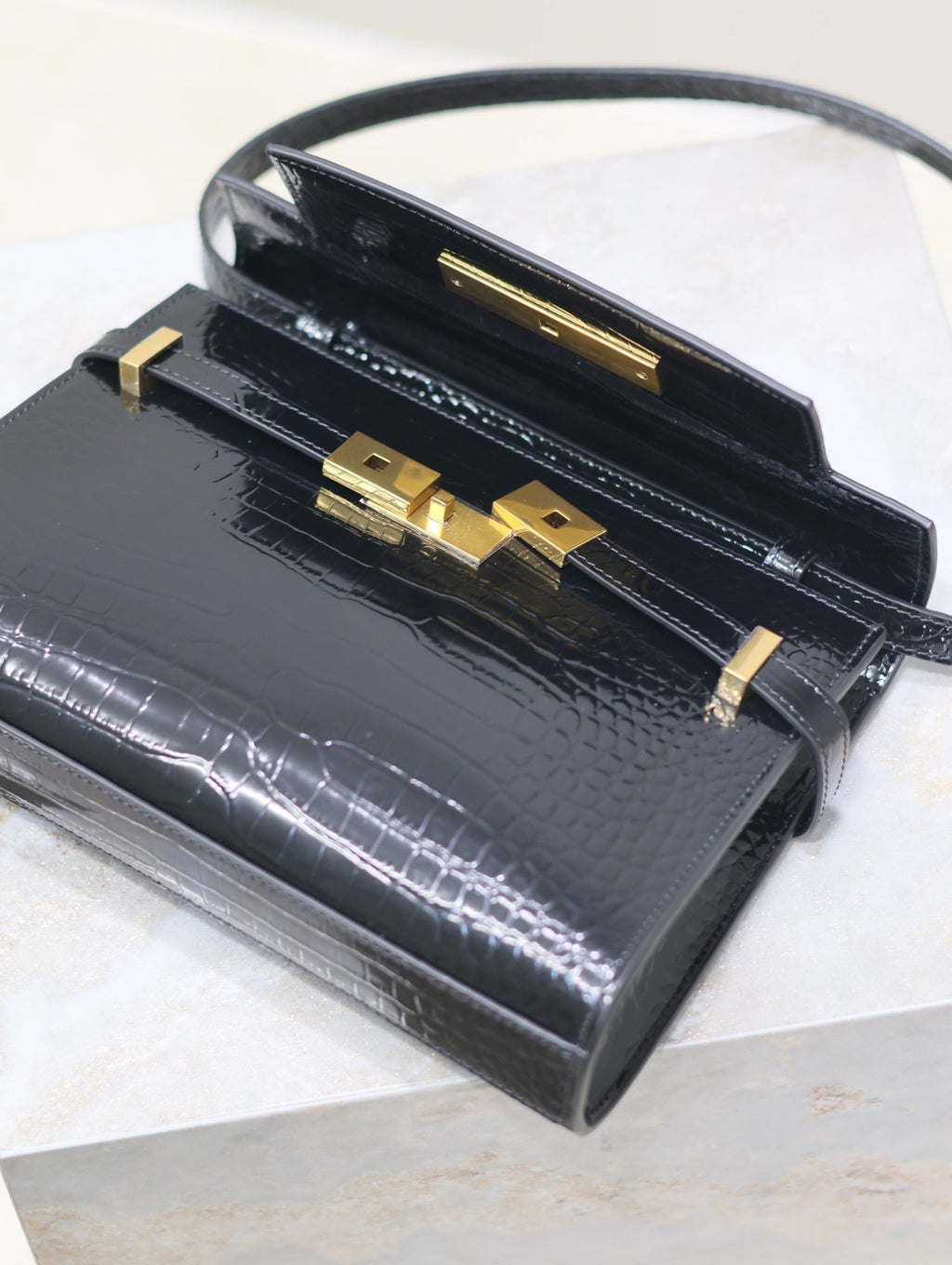 SAINT LAURENT MANHATTAN SMALL 24 IN BLACK CROCODILE PATTERN GLOSSY CALFSKIN GOLD BUCKLE